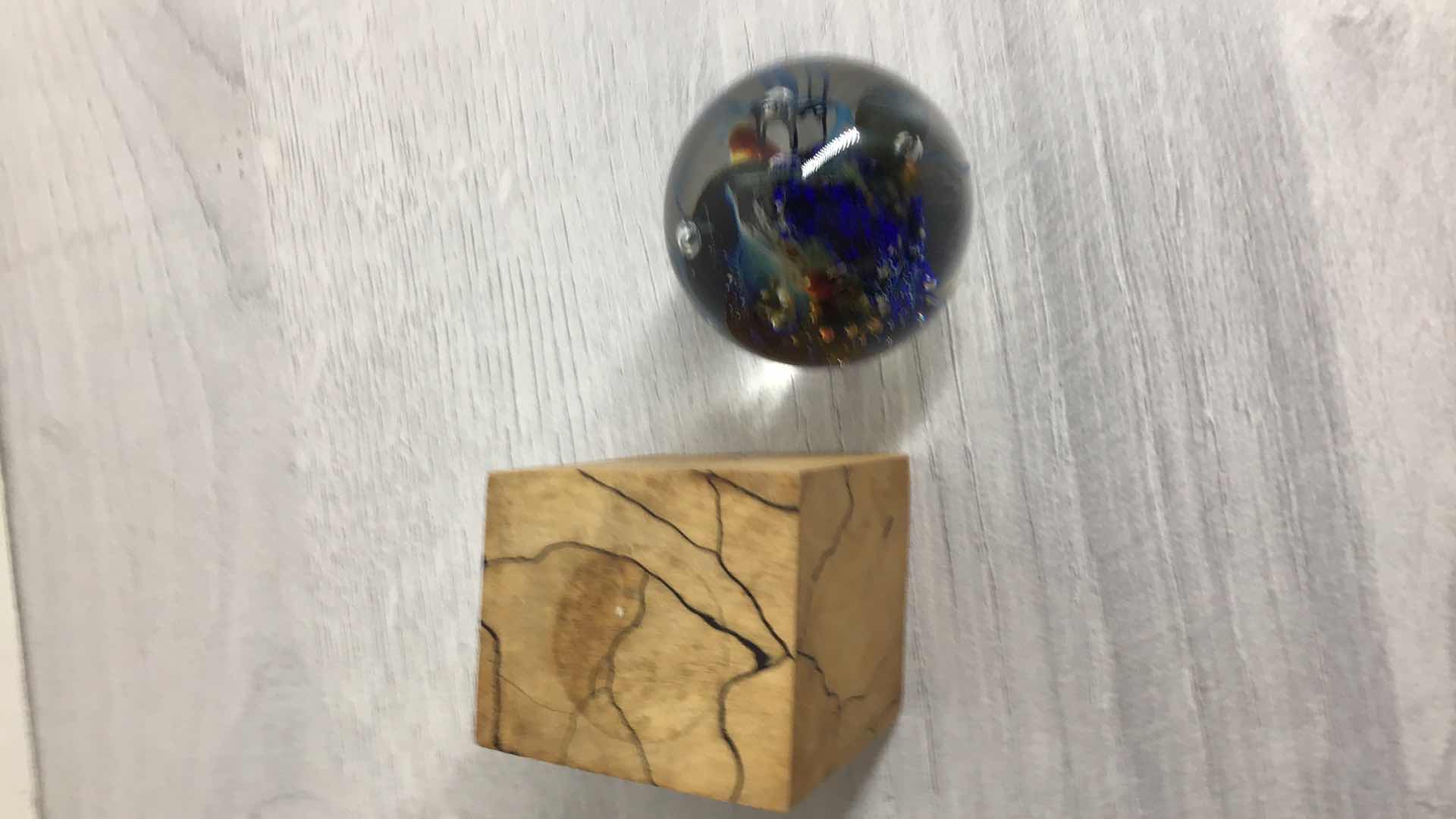 Photo 1 of ORNATE DESIGN BLOWN GLASS SPHERE ART W CORK FINISH STAND 2” X 2”