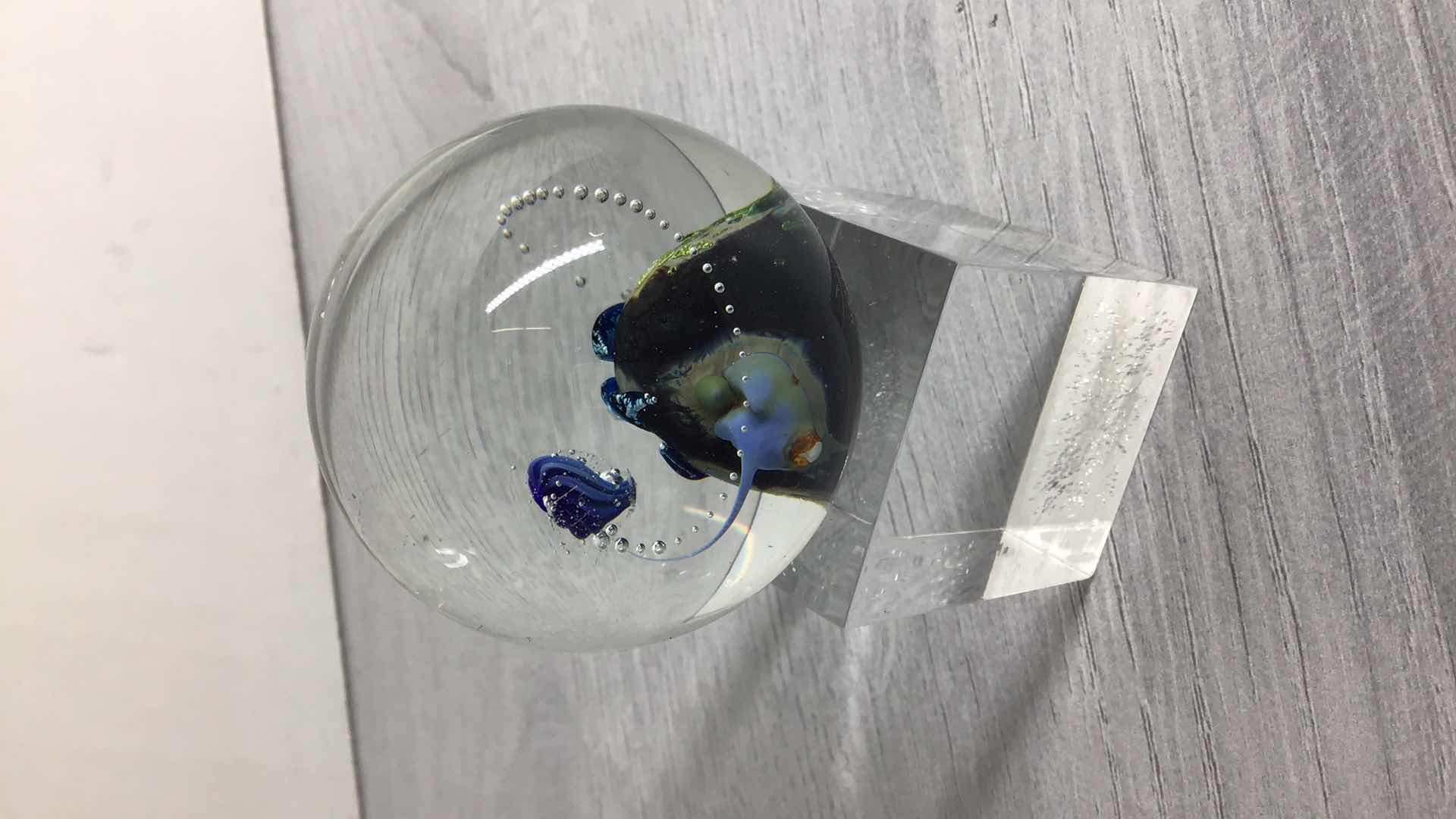 Photo 1 of ORNATE DESIGN BLOWN GLASS SPHERE ART W RESIN STAND 2” X 4”