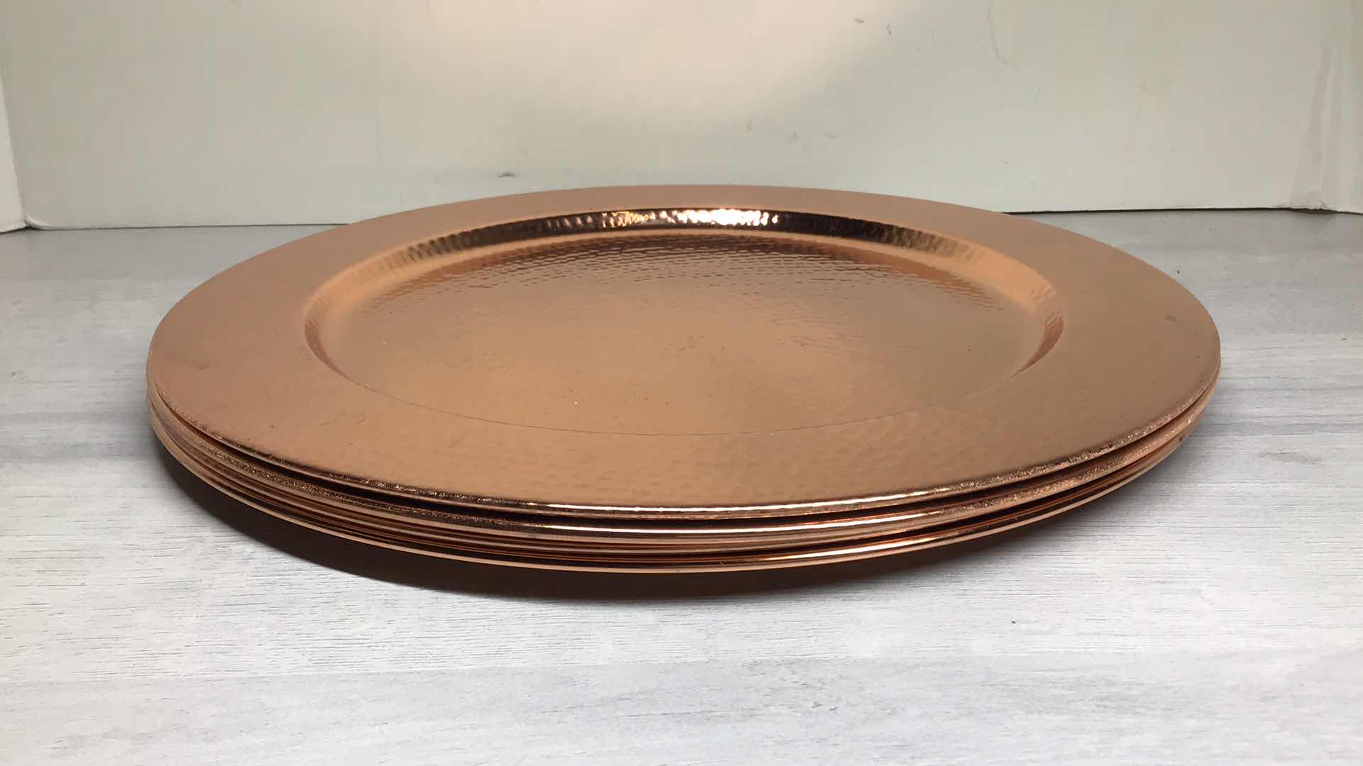 Photo 1 of WILLIAM SONOMA HAMMERED COPPER PLATED CHARGER PLATES SET OF 4