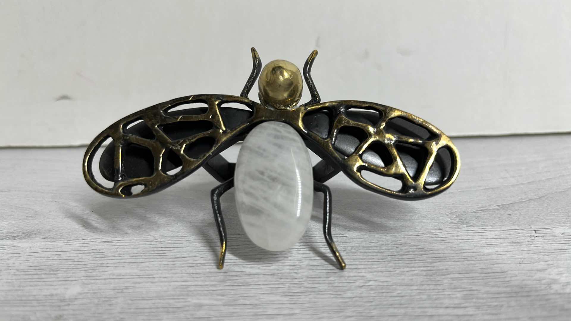 Photo 1 of KIM SEYBERT FLY AWAY BRASS NAPKIN RING W QUARTZ ABDOMEN 3” X 4” H2” (6)