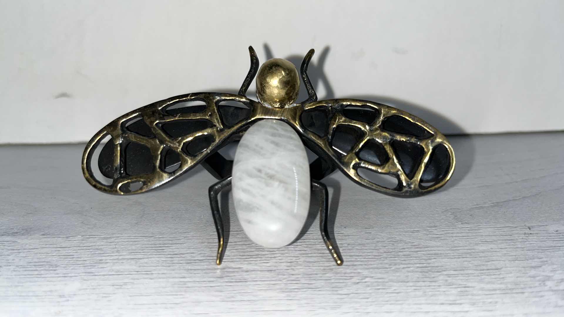 Photo 1 of KIM SEYBERT FLY AWAY BRASS NAPKIN RING W QUARTZ ABDOMEN 3” X 4” H2” (6)