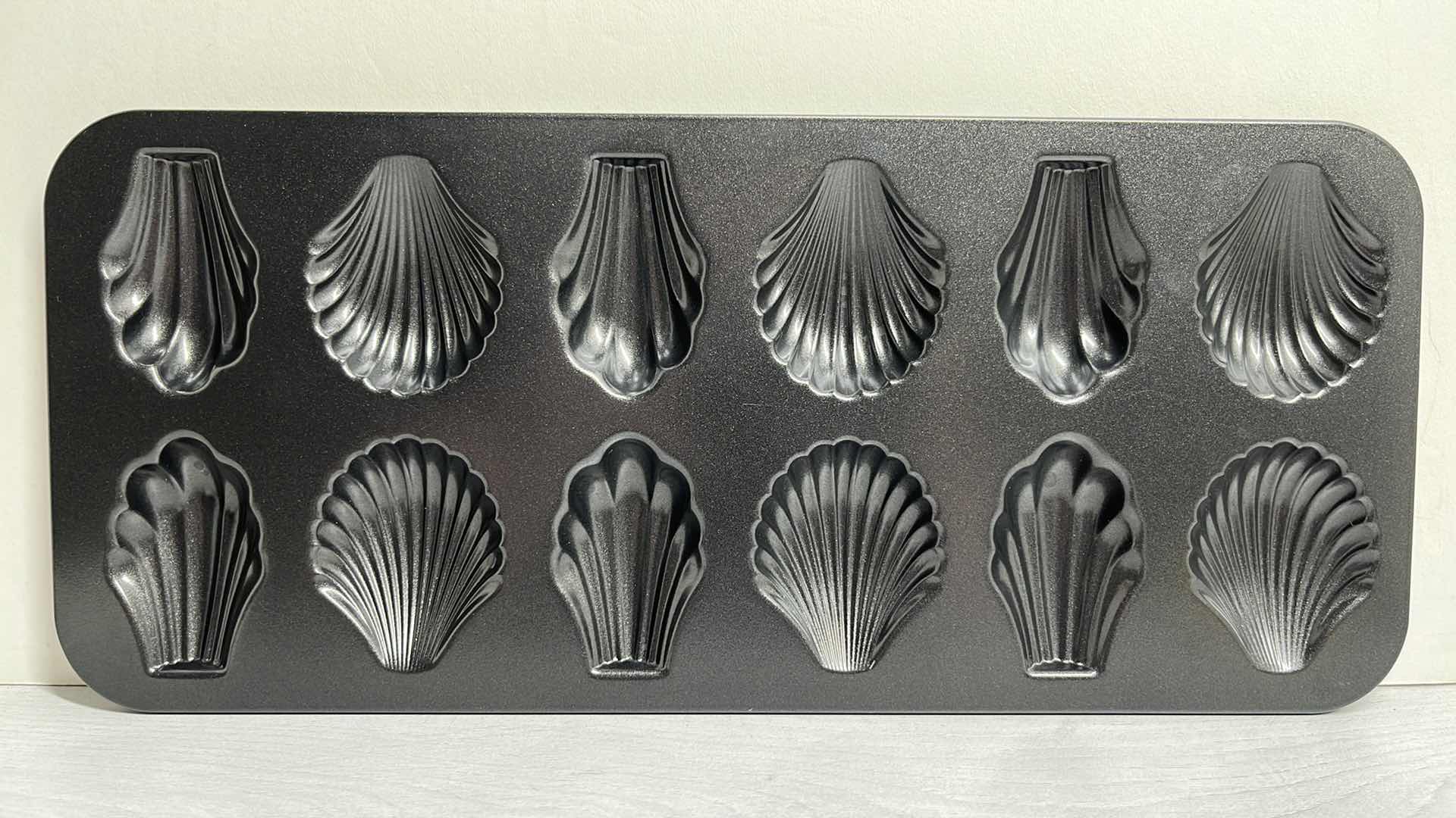 Photo 1 of NONSTICK MADELEINE PAN 12 CAVITY SCALLOP SHELL BAKEWARE 7” X 16” (2)
