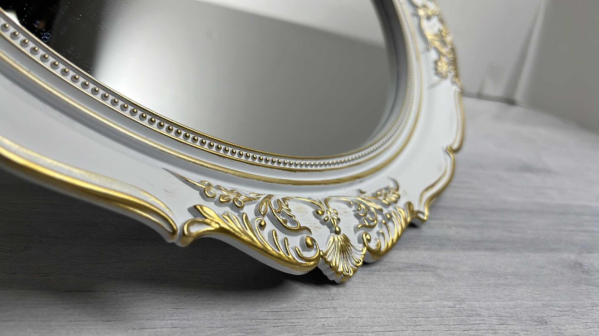 View 3 of MID CENTURY STYLE RESIN OVAL WHITE/GOLD HANGING MIRRORS 13” X 15” (5)
