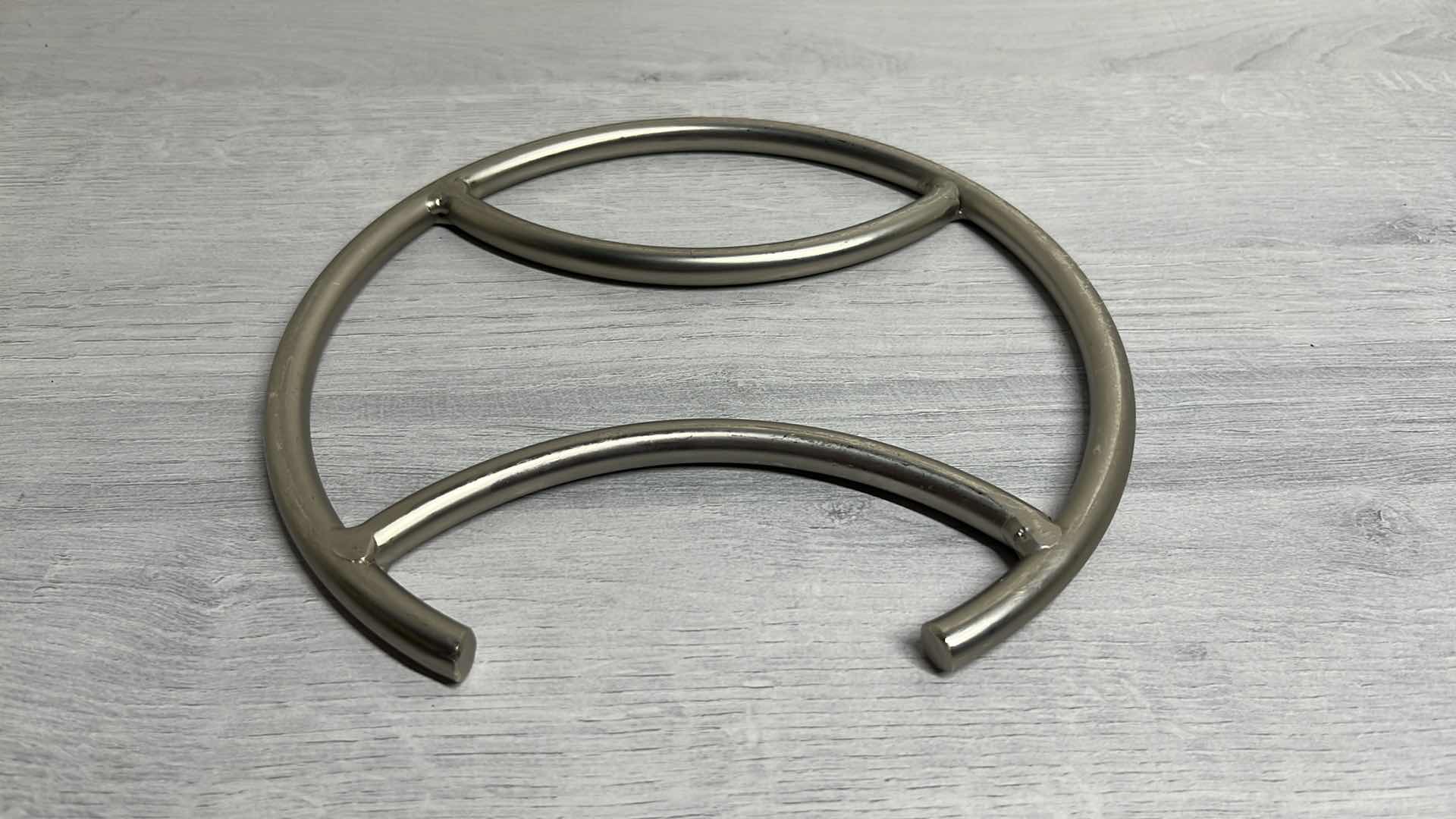 Photo 1 of METAL 8” TRIVET (2)