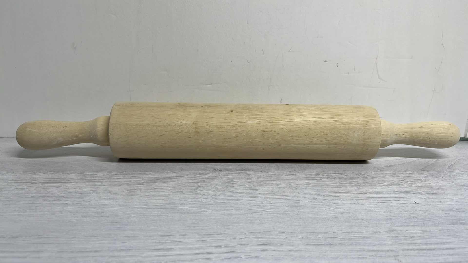 Photo 1 of CALPHALON 12” x 17” BAKING SHEET, 12 CAVITY MUFFIN PAN & 17” ROLLING PIN