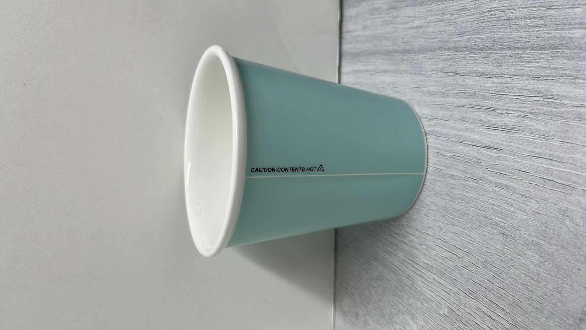 Photo 1 of TIFFANY & CO EVERY DAY OBJECTS BLUE PAPER ESPRESSO CUP, FINE BONE CHINA 3.5” X 3.75” (1)