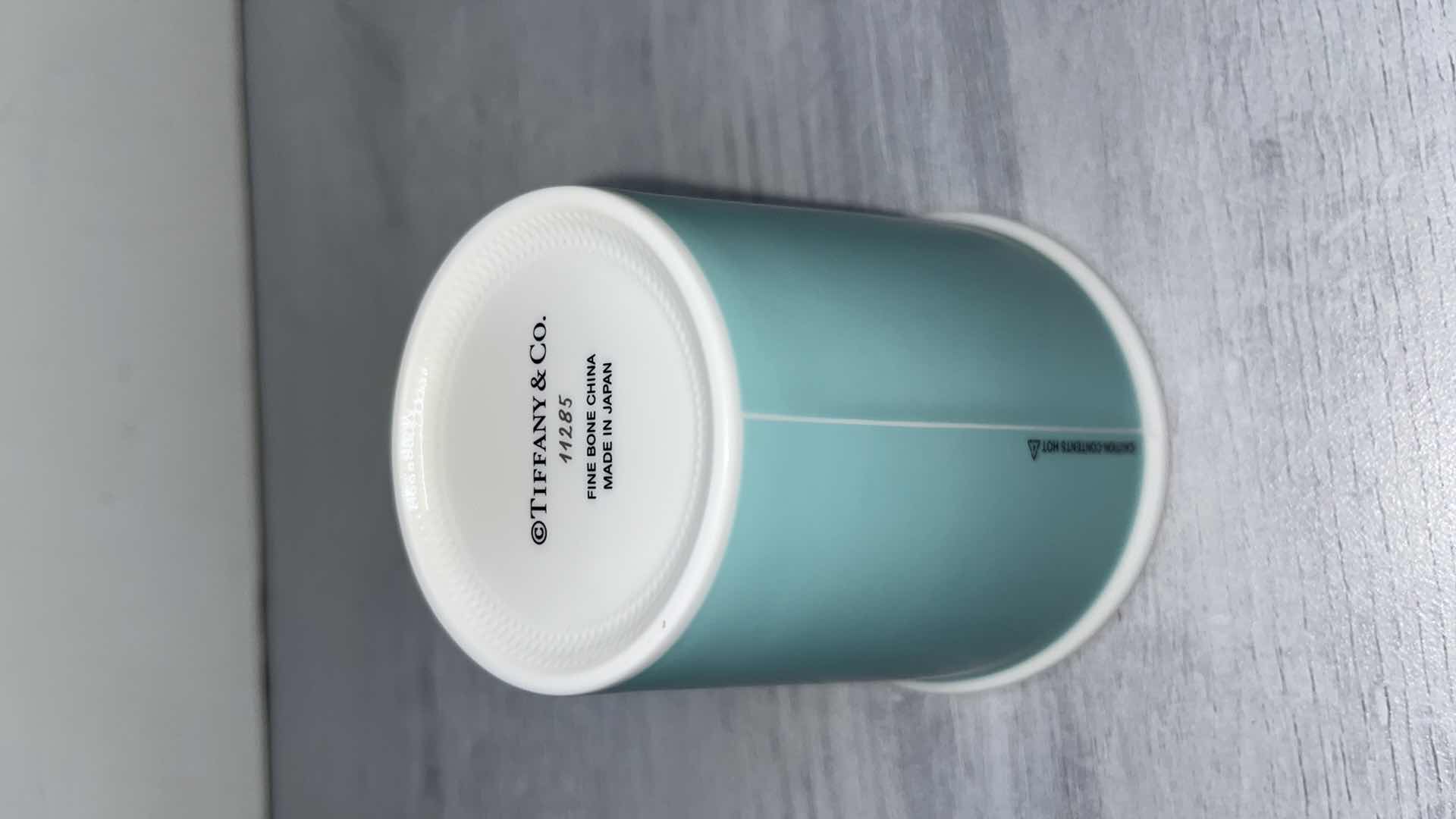 Photo 1 of TIFFANY & CO EVERY DAY OBJECTS BLUE PAPER ESPRESSO CUP, FINE BONE CHINA 3.5” X 3.75” (1)