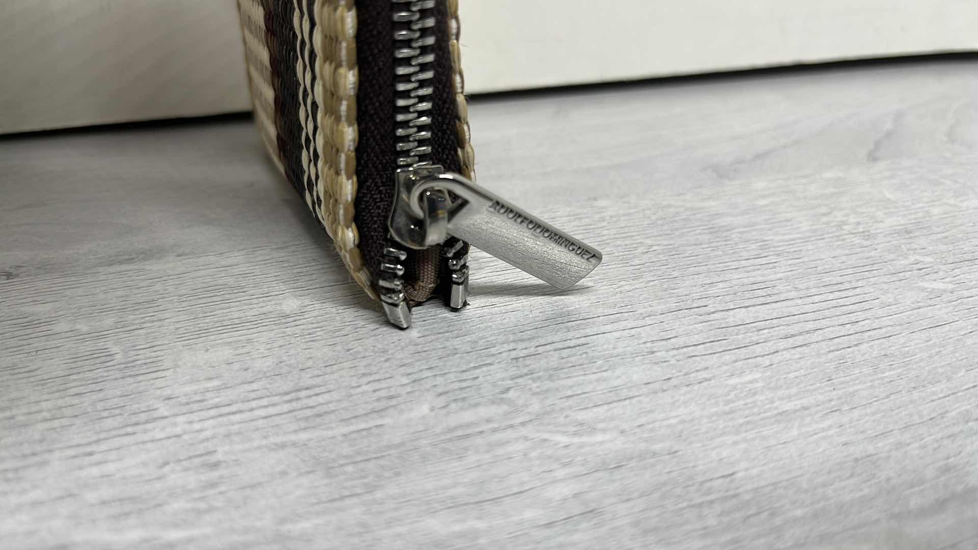 Photo 1 of ADOLFO DOMINGUEZ NATURAL RAFFIA-STYLE COIN PURSE W LOGO TAG 5” X 1” H4”