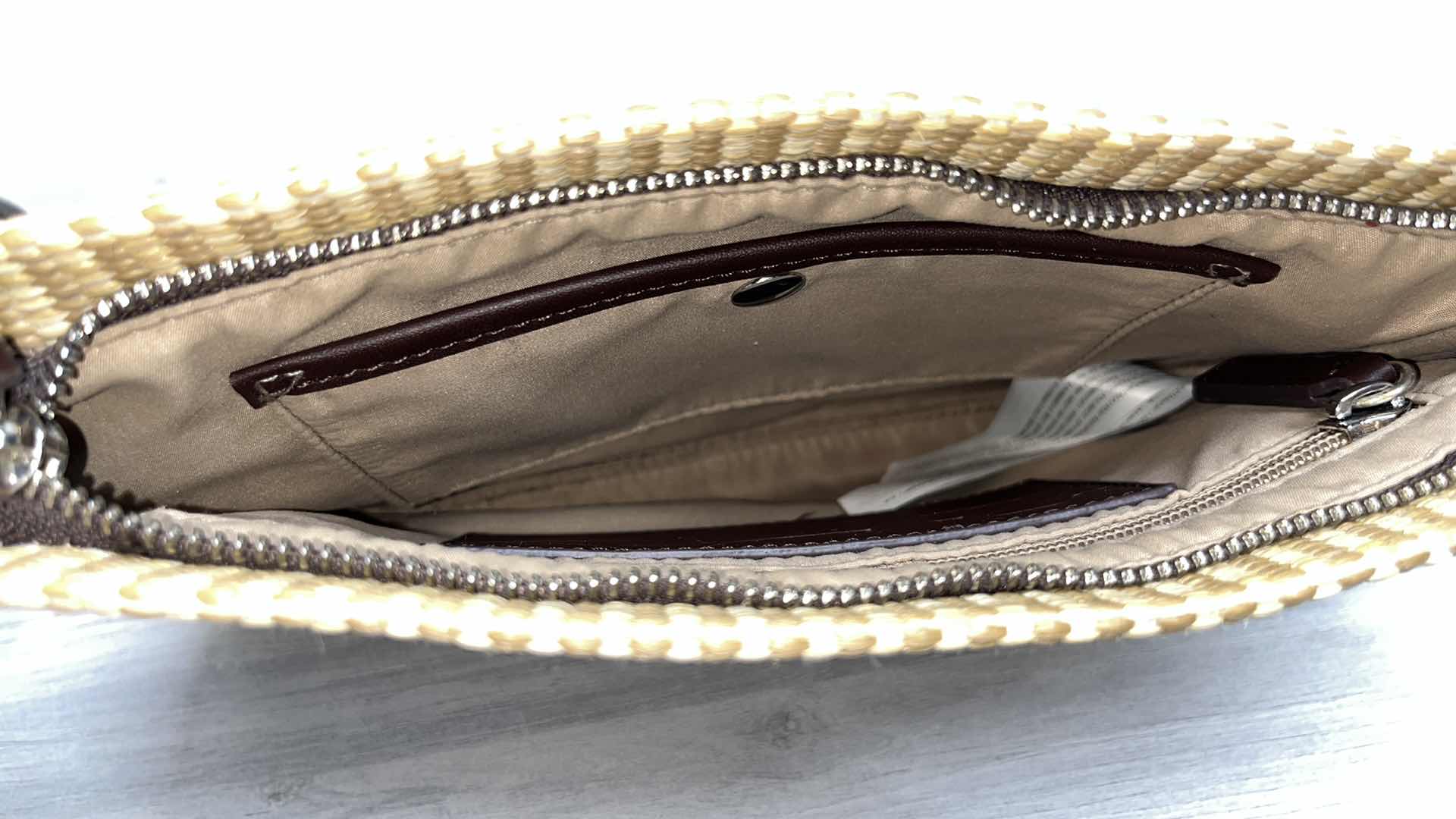 Photo 1 of ADOLFO DOMINGUEZ NATURAL RAFFIA-STYLE CLUTCH PURSE W ORNAMENTAL BAG CHARMS 10.75” X 1” H7.75”