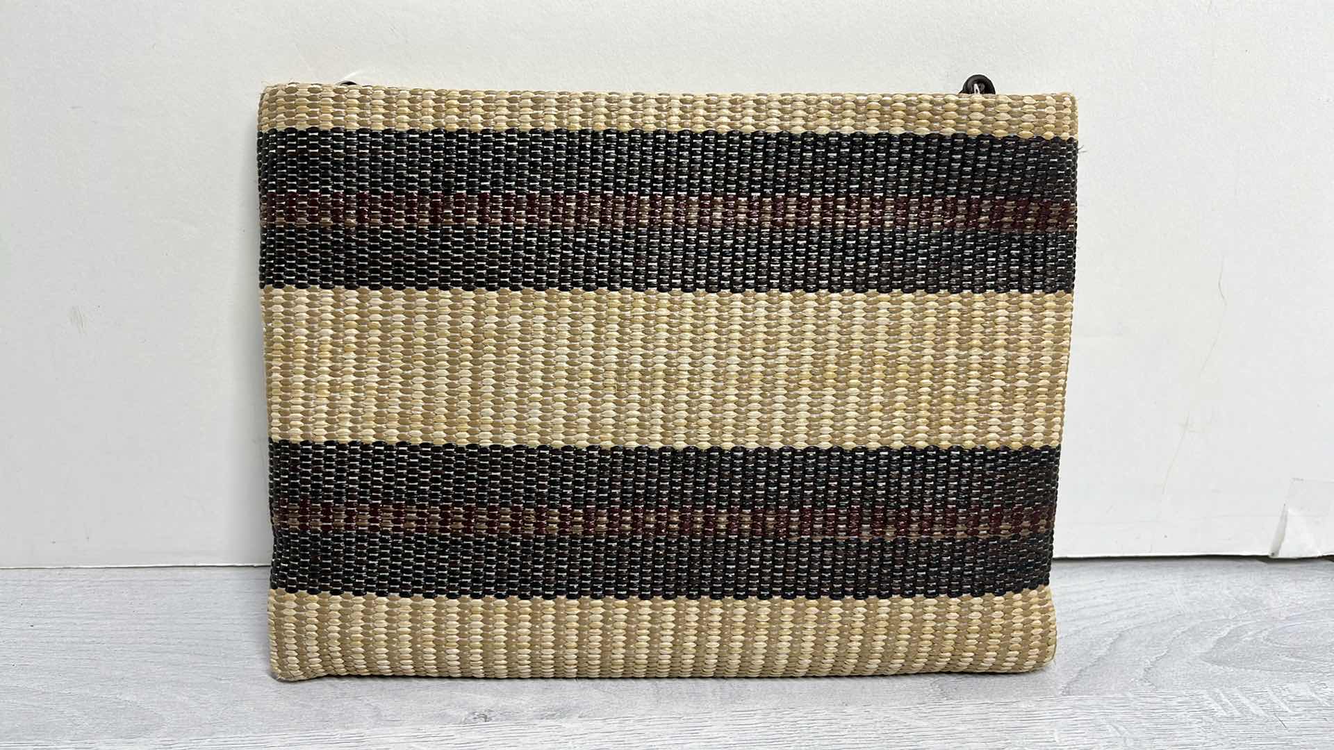 Photo 1 of ADOLFO DOMINGUEZ NATURAL RAFFIA-STYLE CLUTCH PURSE W ORNAMENTAL BAG CHARMS 10.75” X 1” H7.75”