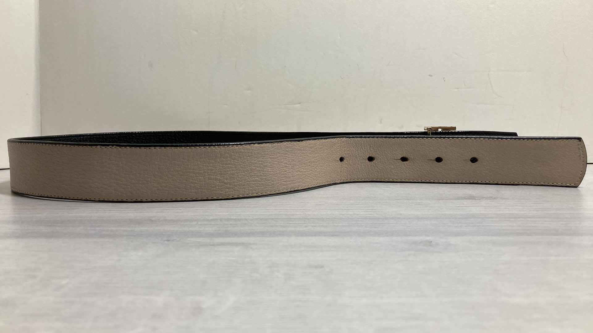 Photo 1 of TORY BURCH REVERSIBLE BLACK & TAN BELT 34”