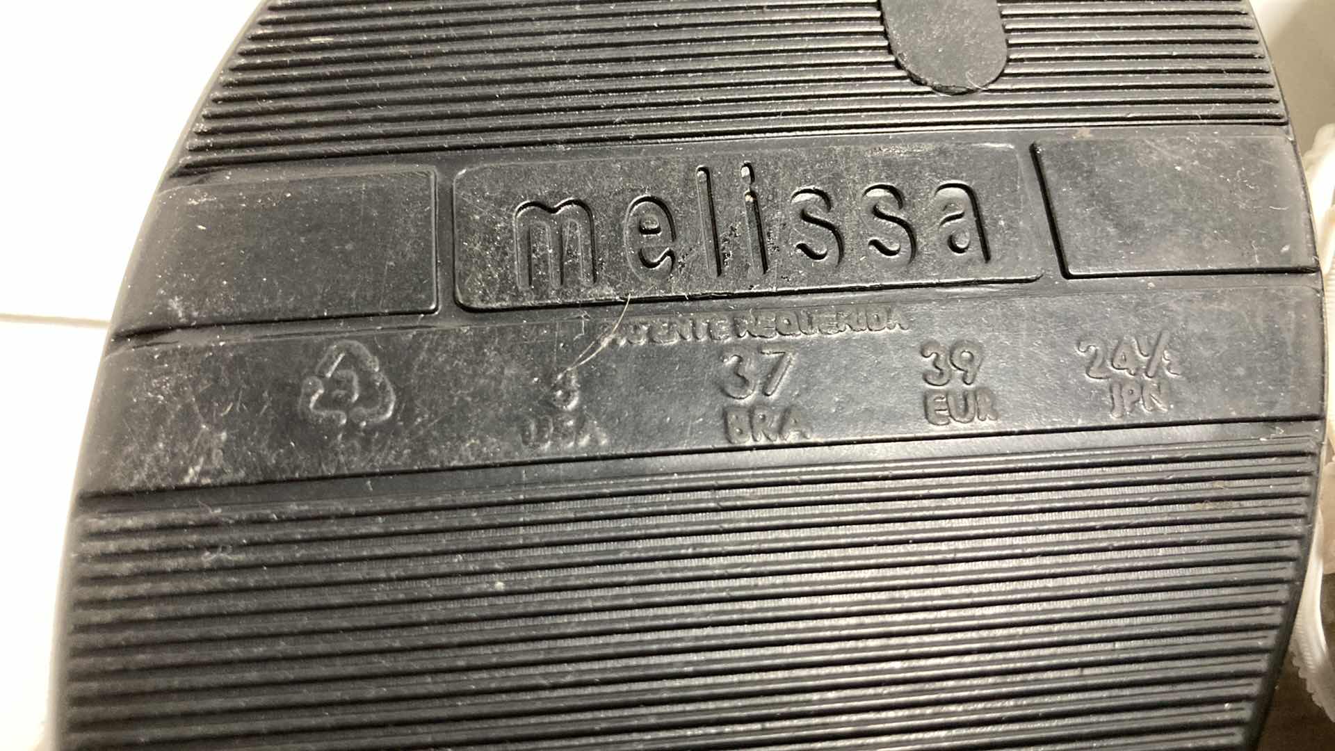 Photo 1 of MELISSA BLACK & WHITE FLORAL RUBBER SANDALS SIZE US 8