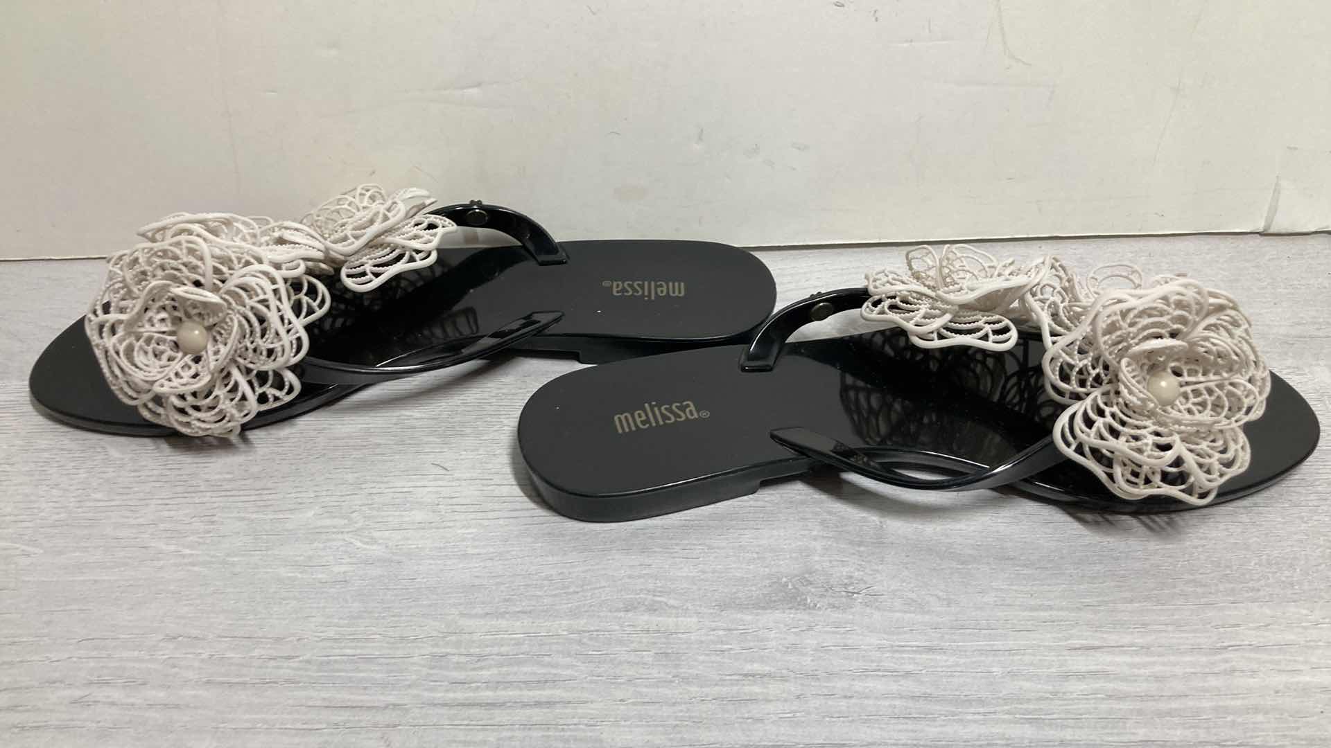 Photo 1 of MELISSA BLACK & WHITE FLORAL RUBBER SANDALS SIZE US 8