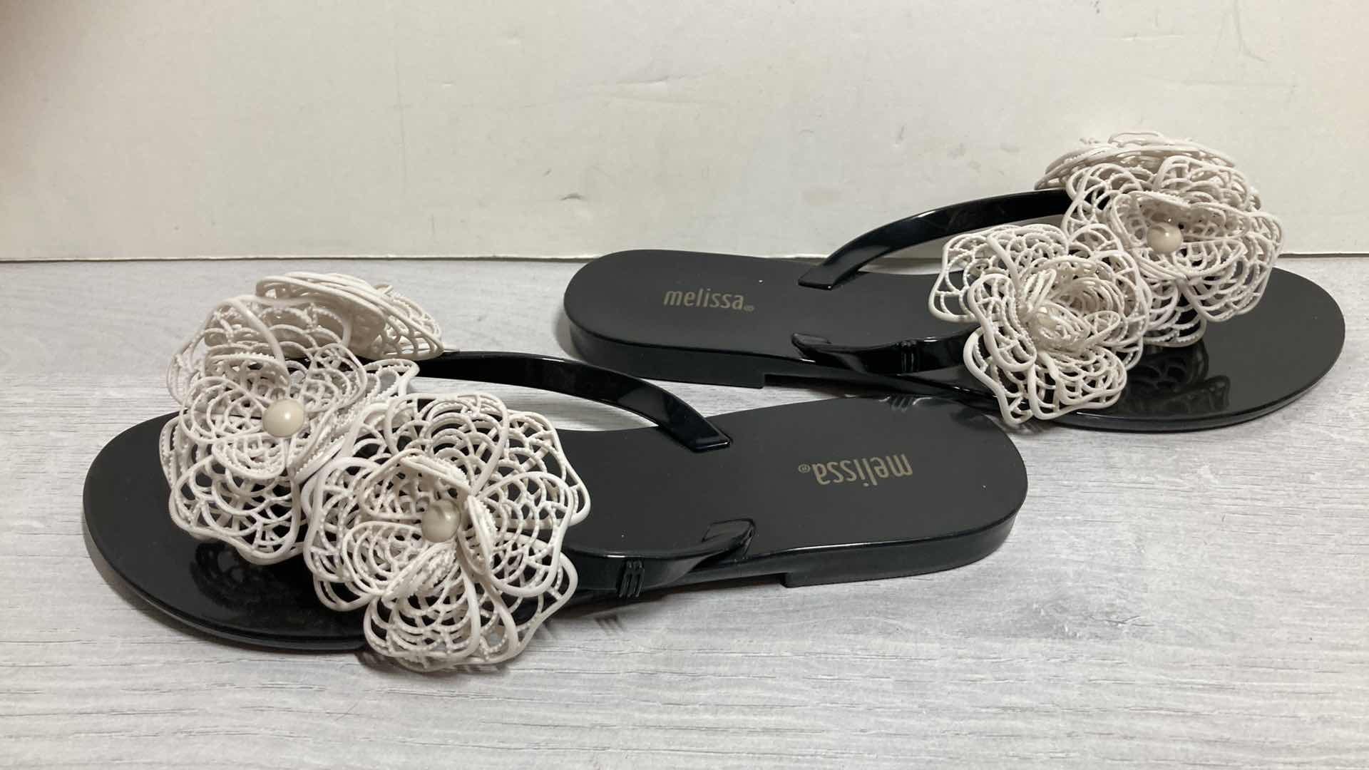 Photo 1 of MELISSA BLACK & WHITE FLORAL RUBBER SANDALS SIZE US 8