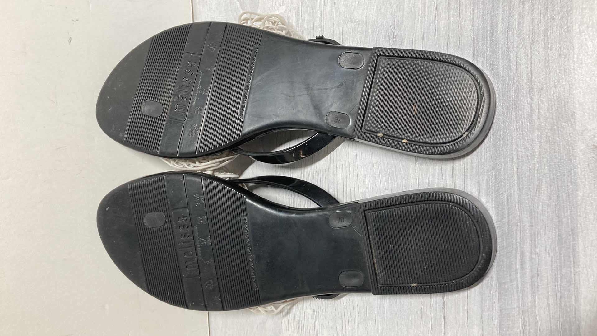 Photo 1 of MELISSA BLACK & WHITE FLORAL RUBBER SANDALS SIZE US 8