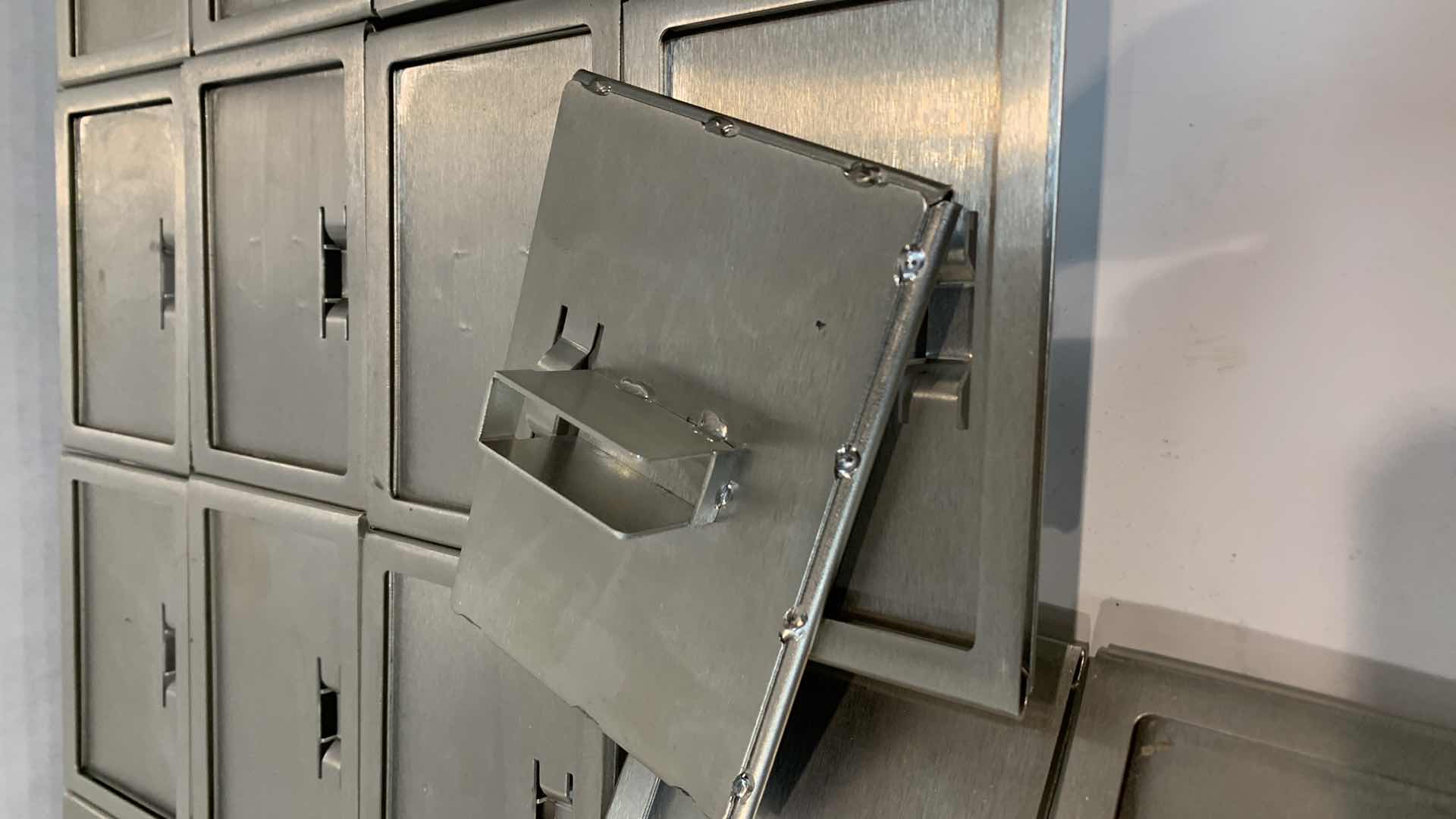 Photo 1 of EIGHTEEN METAL RETAIL SIGN HOLDERS 4” X 5”