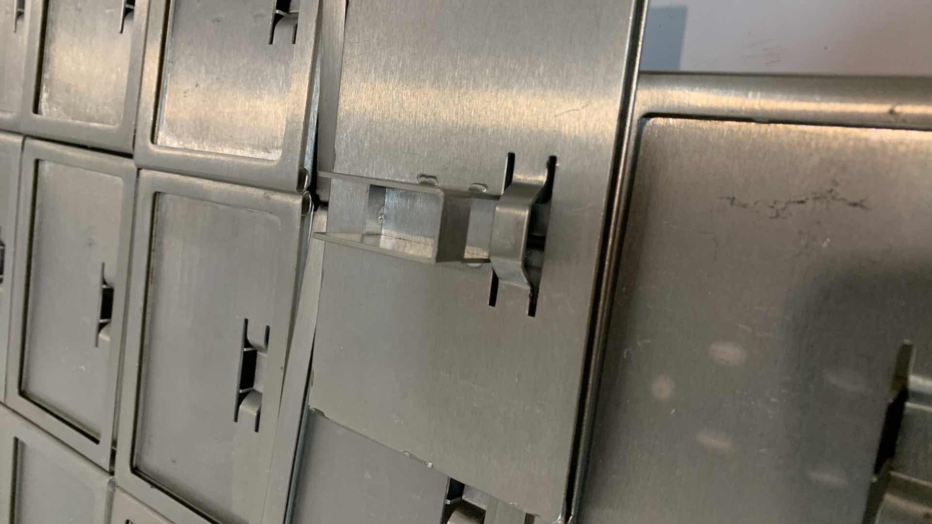 Photo 1 of NINETEEN METAL RETAIL SIGN HOLDERS 4” X 5”