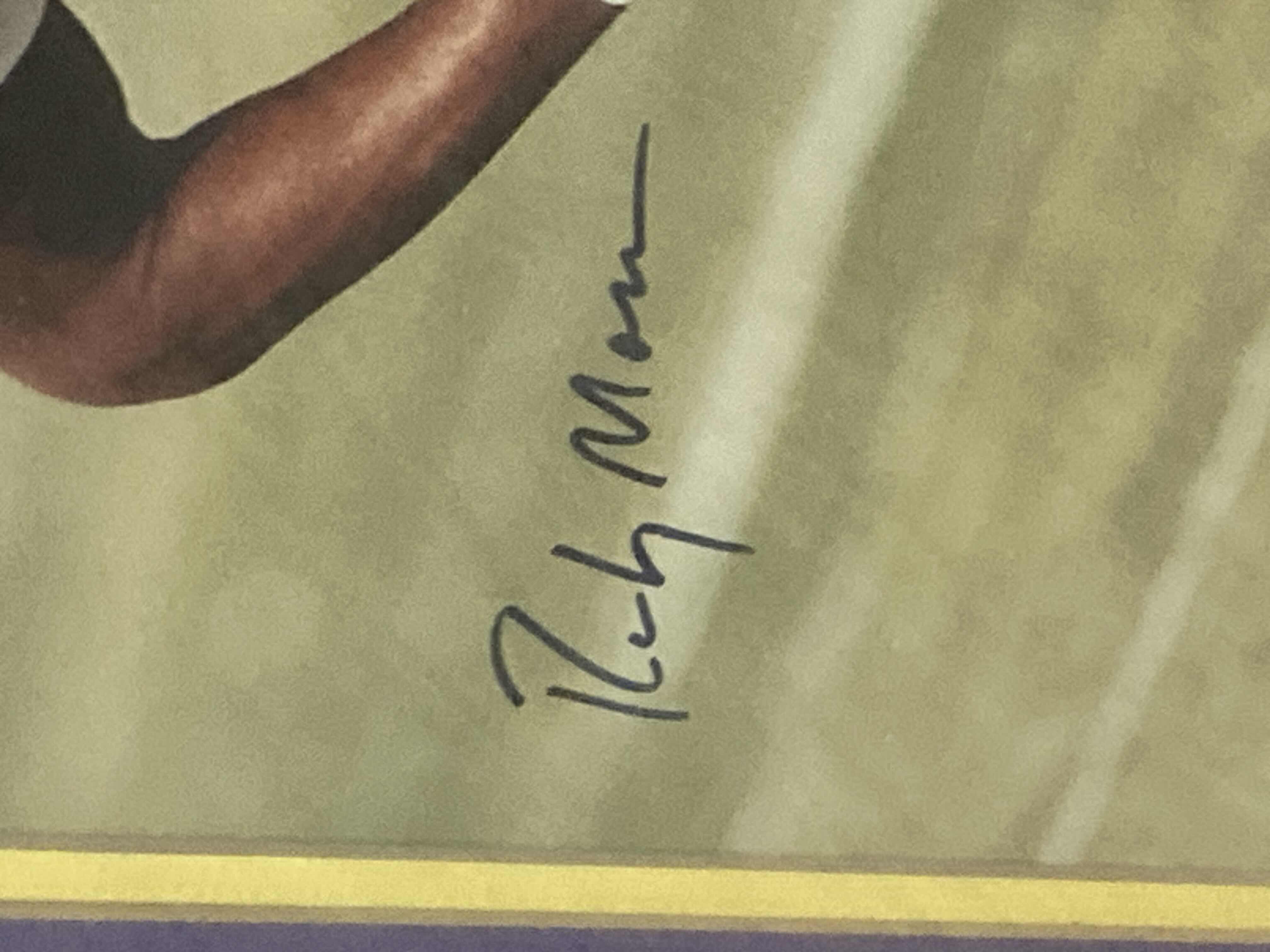 Photo 1 of RANDY MOSS VIKINGS #84 NFL FOOTBALL FRAMED PHOTOGRAPH AUTOGRAPHED BY RANDY MOSS NO COA 19.25” X 22.75”