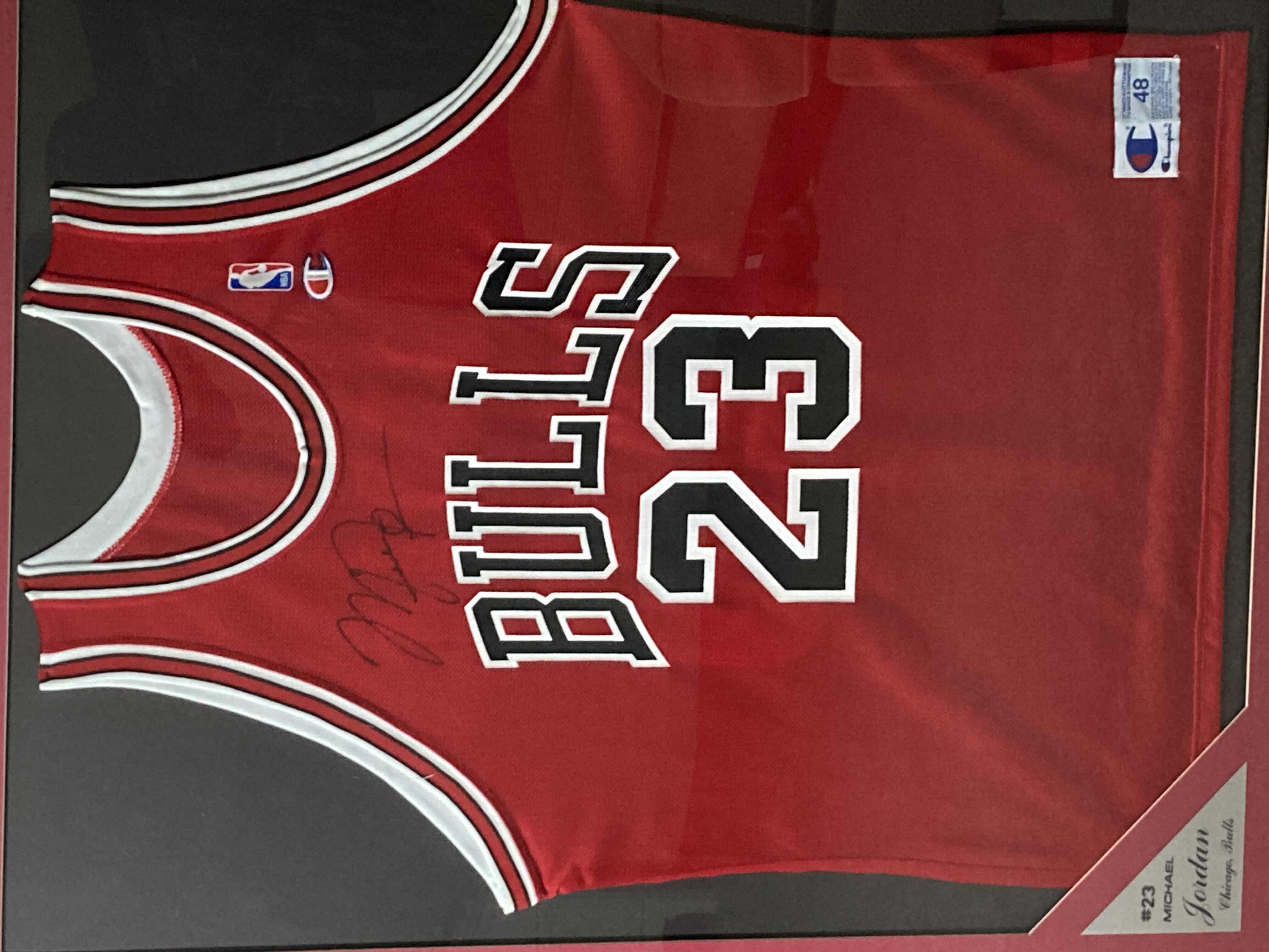 Photo 1 of MICHAEL JORDAN BULLS #23 FRAMED JERSEY AUTOGRAPHED BY MICHAEL JORDAN 35.5” X 43.5”