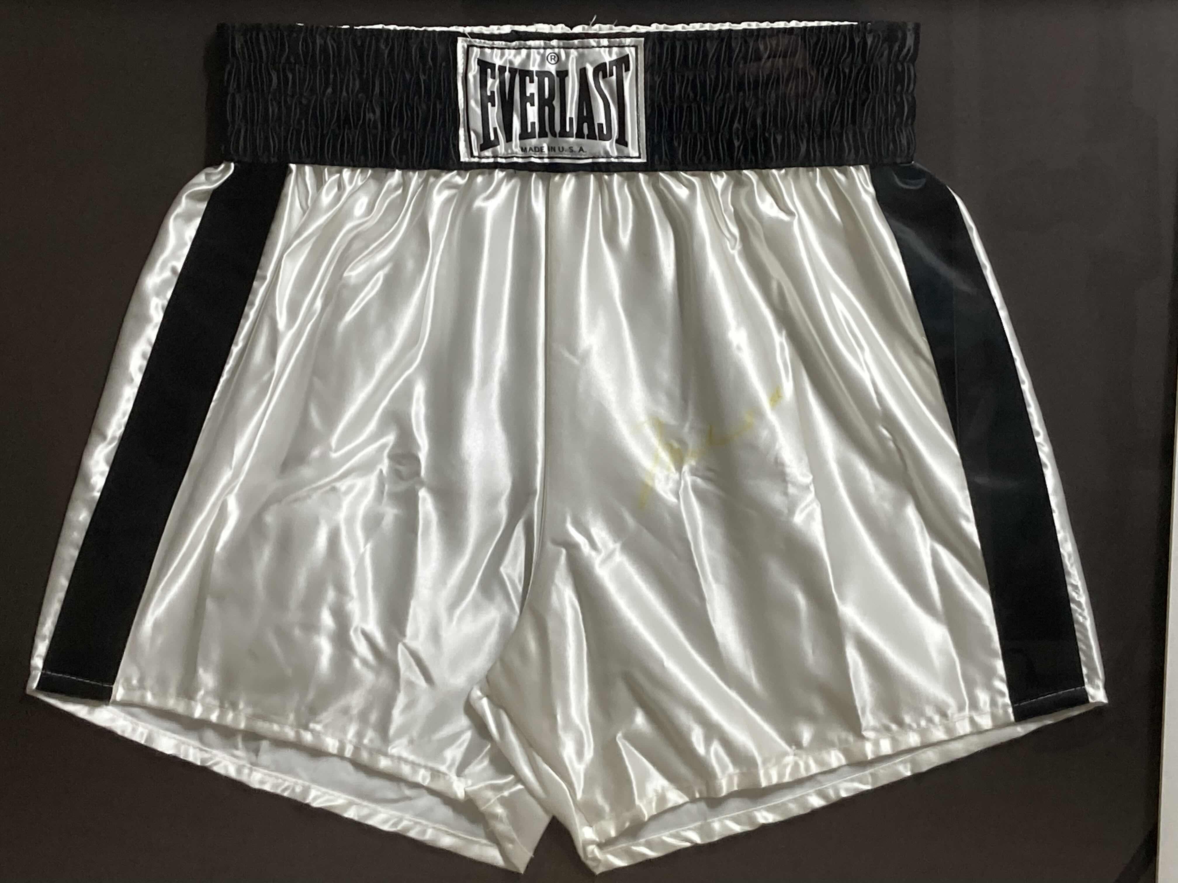 Photo 1 of MOHAMMED ALI FRAMED BOXING EVERLAST SHORTS AUTOGRAPHED BY MOHAMMED ALI NO COA 35” X 29.5”
