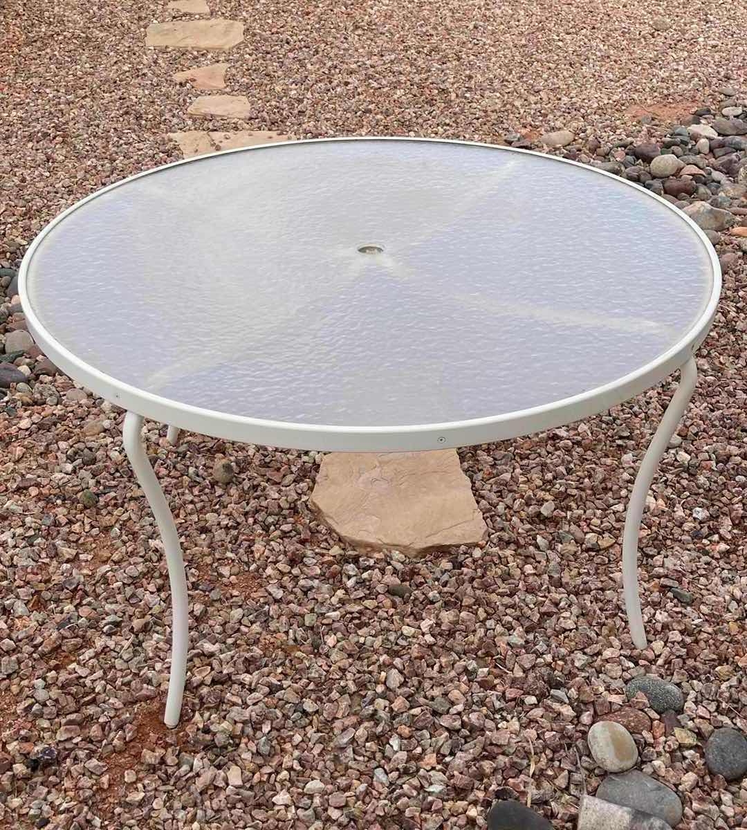 Photo 1 of ROUND ACRYLIC TOP PATIO TABLE  48” X 27”