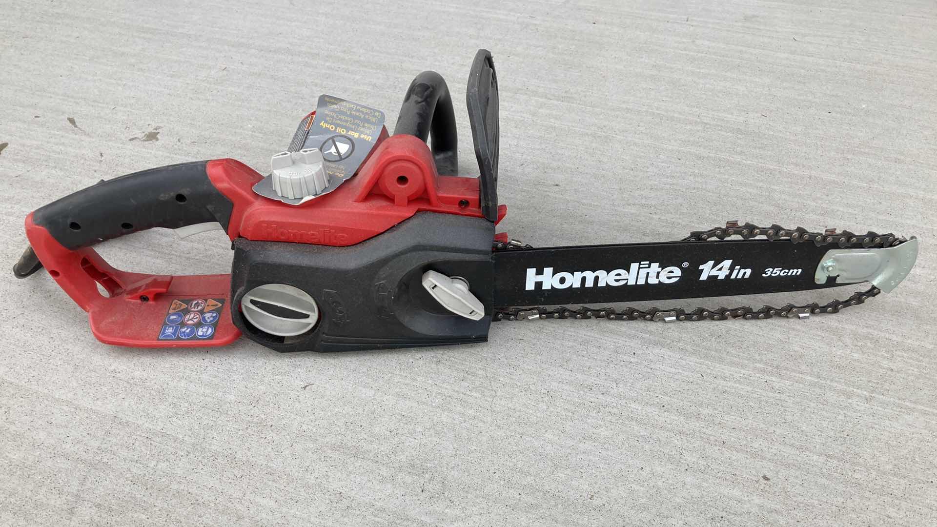 Photo 1 of BLACK & DECKER ELECTRIC HEDGE TRMMER, TORO ELECTRIC BLOWER W HOMELITE GAS CHAINSAW