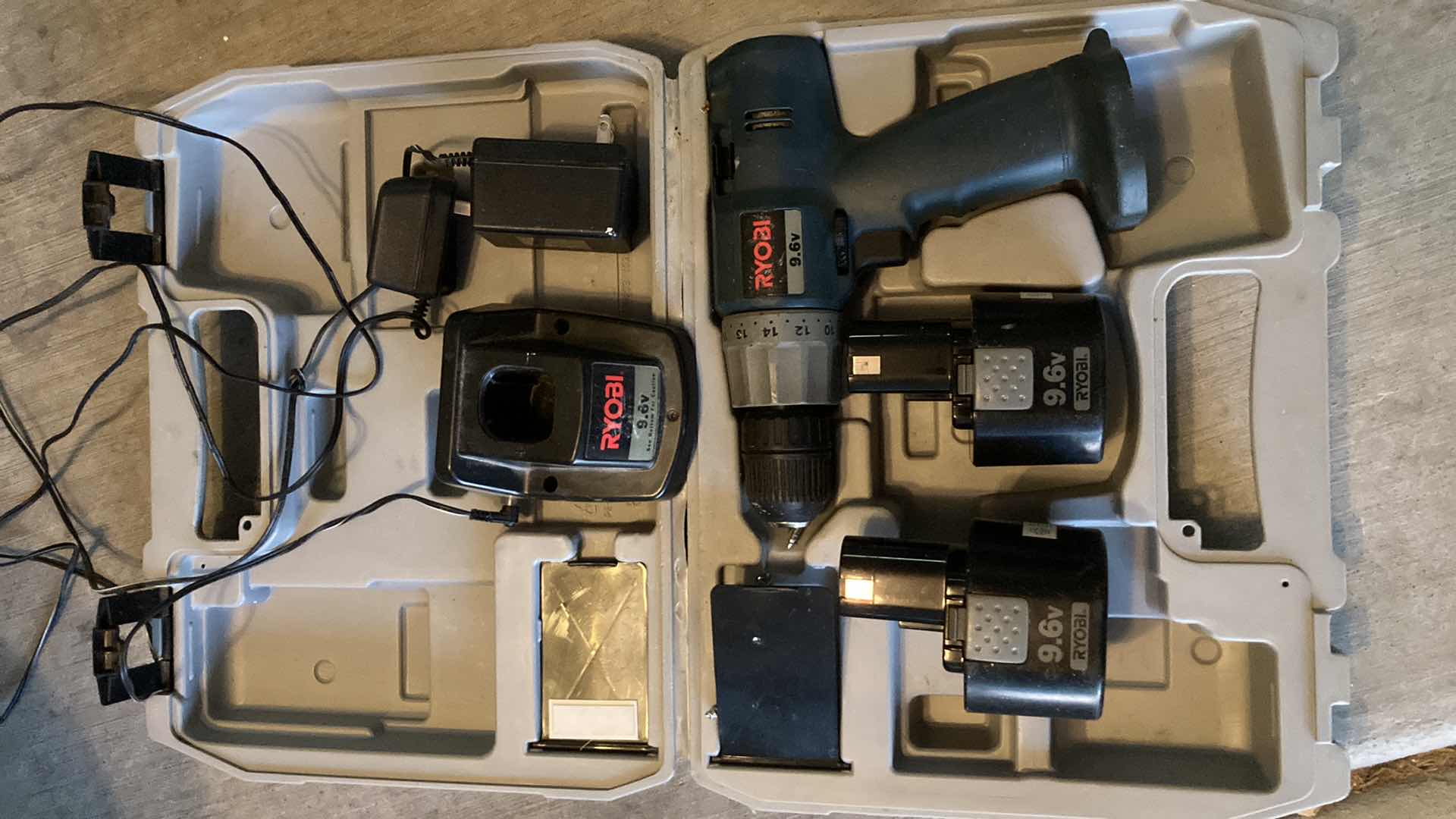 Photo 1 of RYOBI 9.6V CORDLESS DRILL W CHARGER, 2 BATTERIES & CASE MODEL HP961K