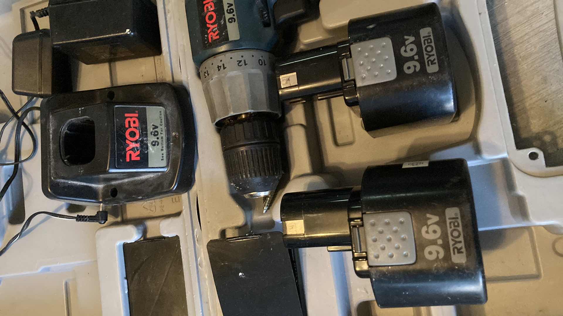 Photo 1 of RYOBI 9.6V CORDLESS DRILL W CHARGER, 2 BATTERIES & CASE MODEL HP961K