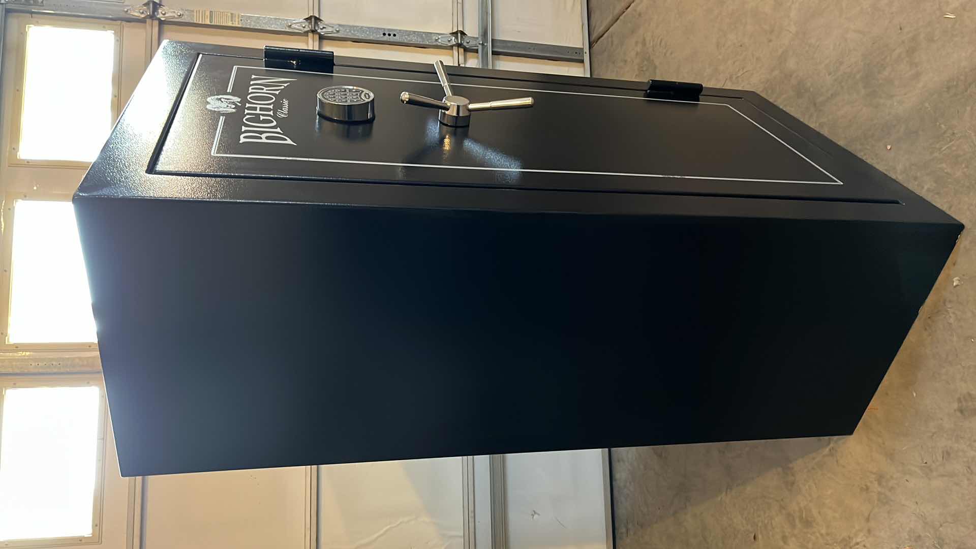 Photo 1 of BIG HORN CLASSIC BLACK GUN SAFE W CODE ENTRY 29” X 22.5” H55.75”