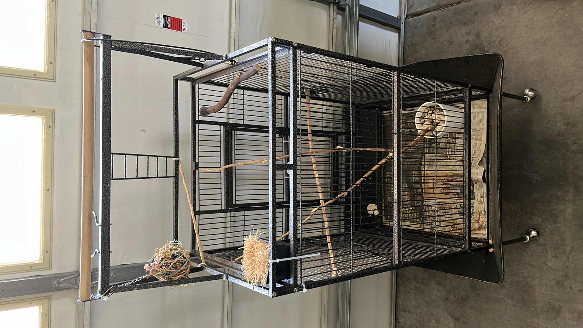 Photo 1 of BLACK GALVANIZED STEEL FINISH ROLLING METAL BIRD CAGE W ACCESSORIES 32” X 30” H70”