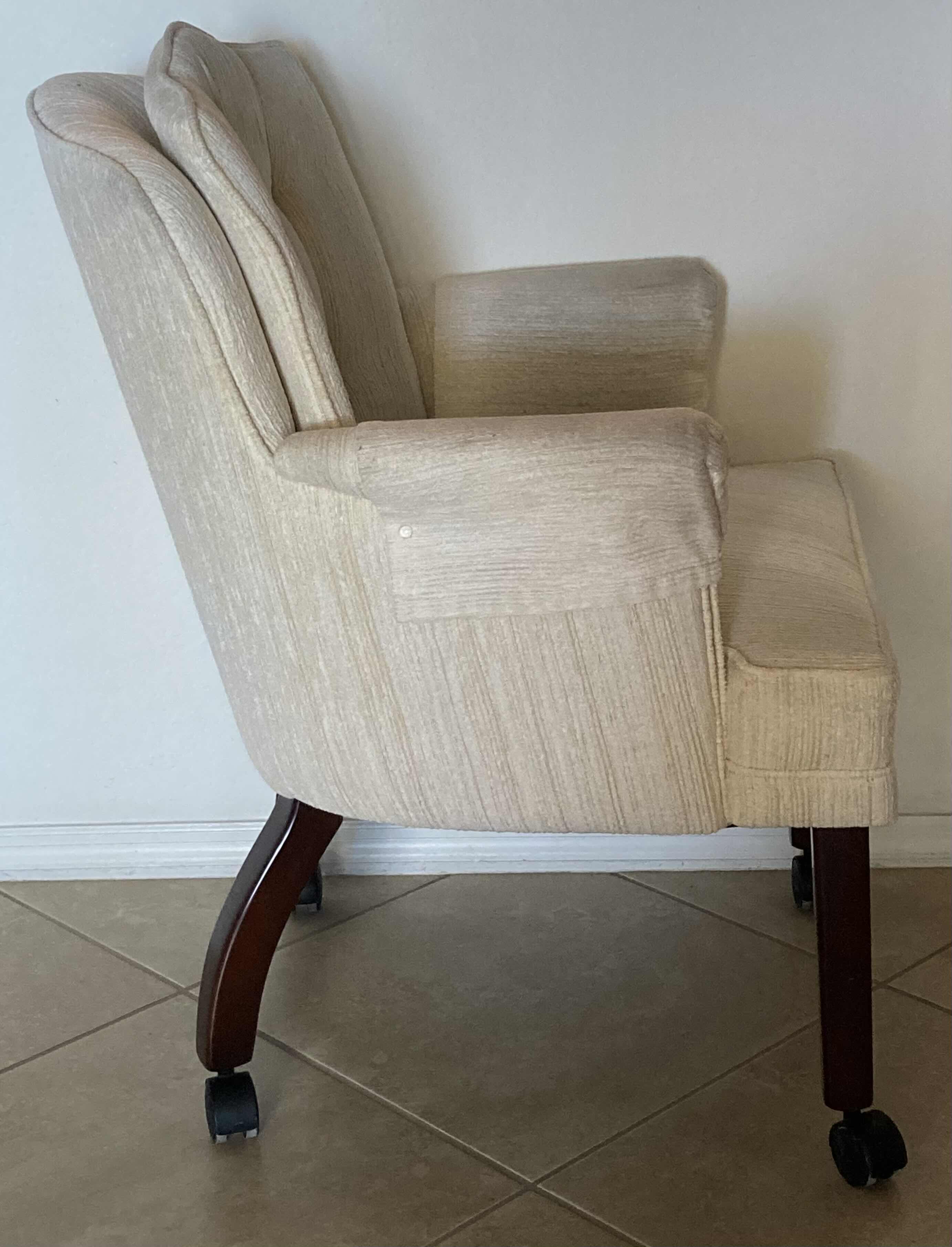Photo 1 of BEIGE UPHOLSTERY SWIVEL CHAIR 24” X 24” H34”