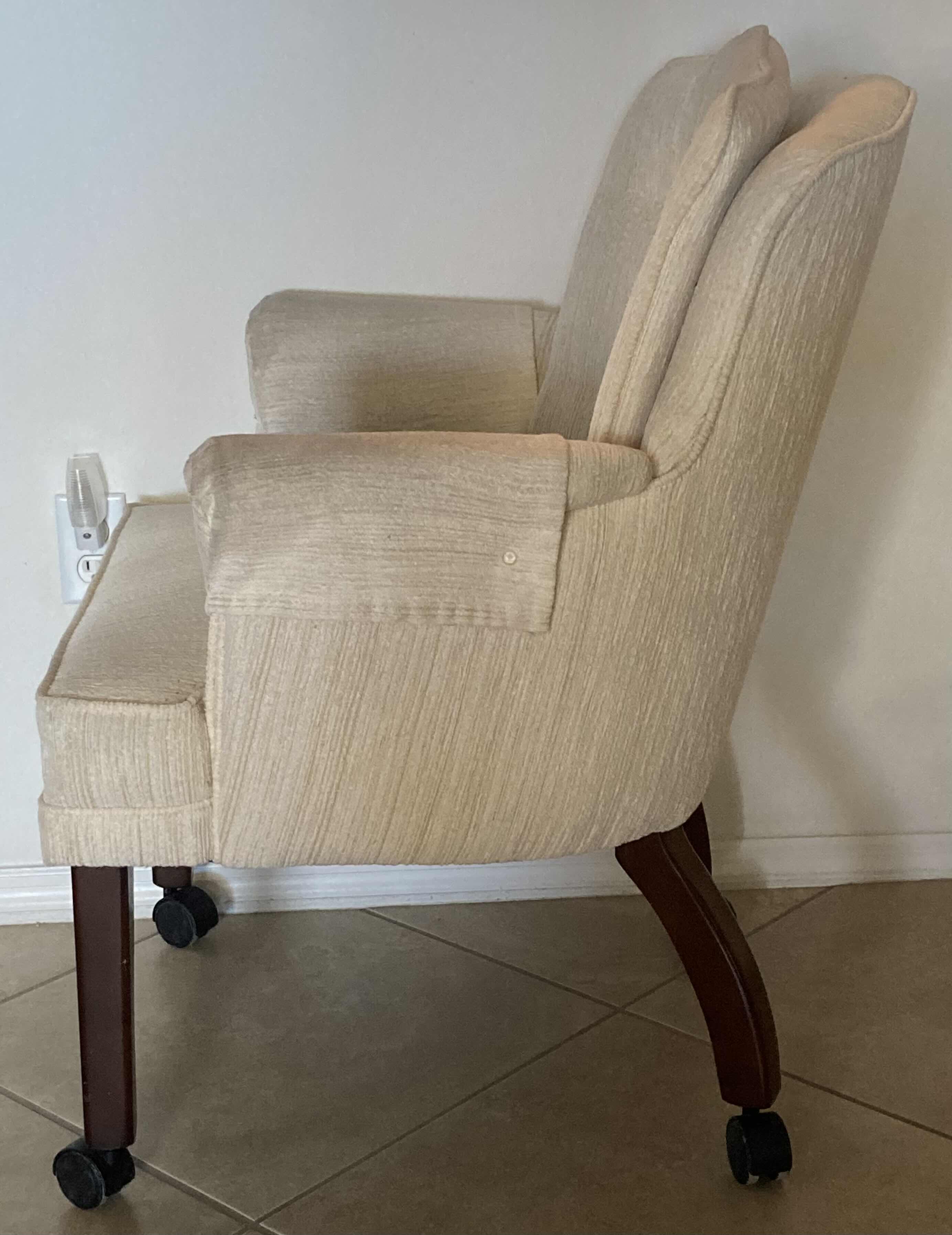 Photo 1 of BEIGE UPHOLSTERY SWIVEL CHAIR 24” X 24” H34”