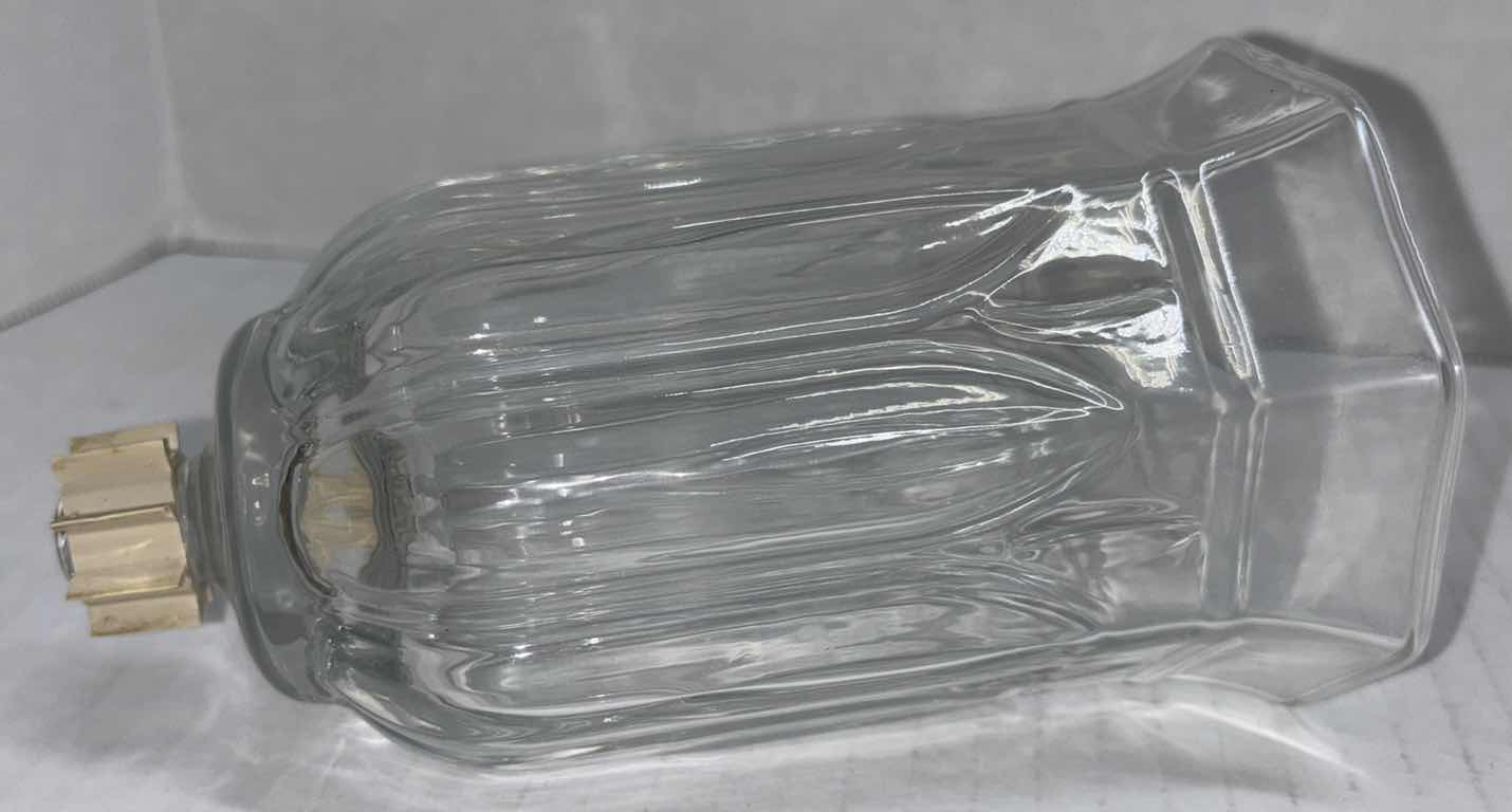 Photo 1 of CLEAR GLASS 5.5” PEG OCTAGON VOTIVE CUPS W CANDLES (4)