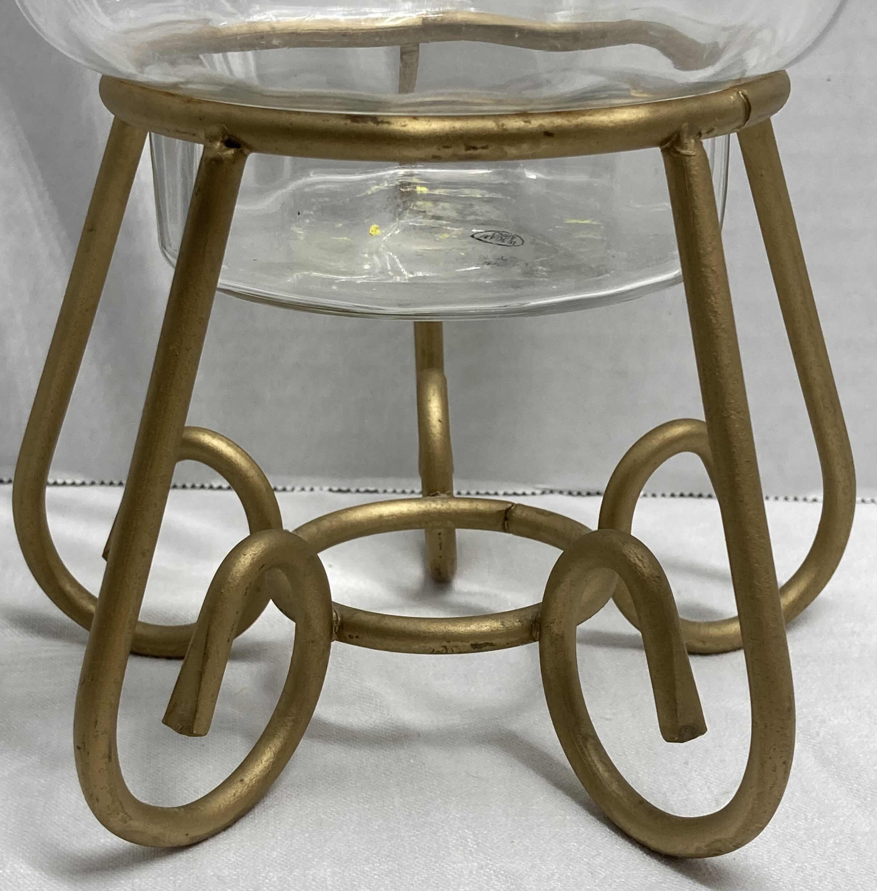 Photo 1 of PLASTIC CANDLE HOLDER W BRASS FINISH STAND 6.5” X 6.5” H10.5”
