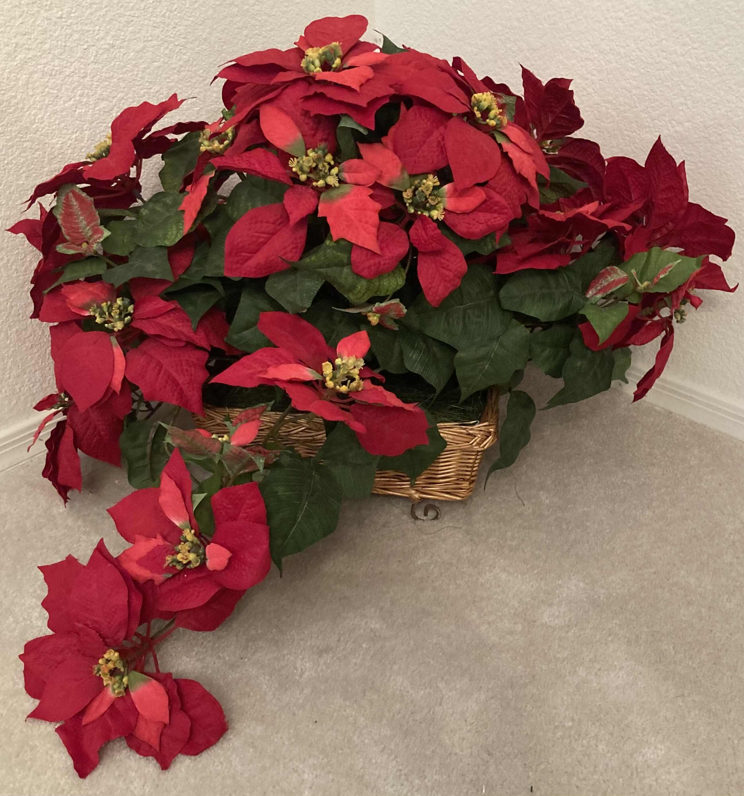Photo 1 of POINSETTIA ARTIFICIAL DECORATIVE FLOWERS W RATTAN BASKET 28” X H18”