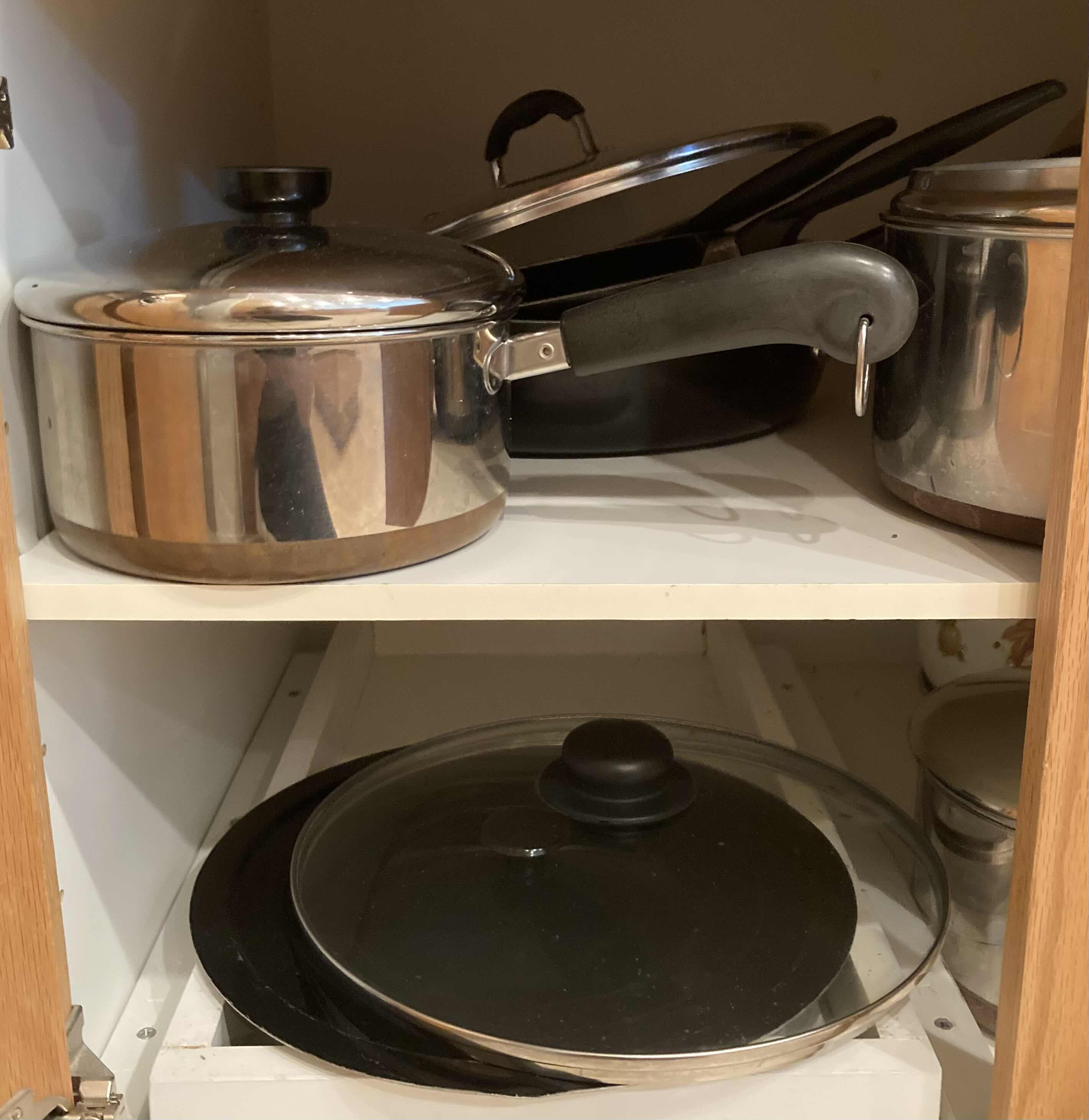 Photo 1 of CONTENTS OF CABINET- POTS & PANS