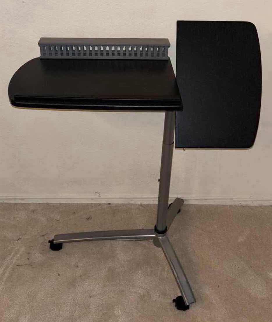 Photo 1 of ROLLING ADJUSTABLE DESK STAND W LAP TOP RISER