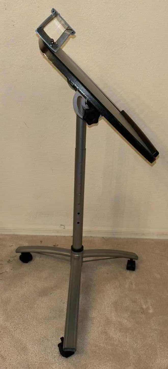 Photo 1 of ROLLING ADJUSTABLE DESK STAND W LAP TOP RISER