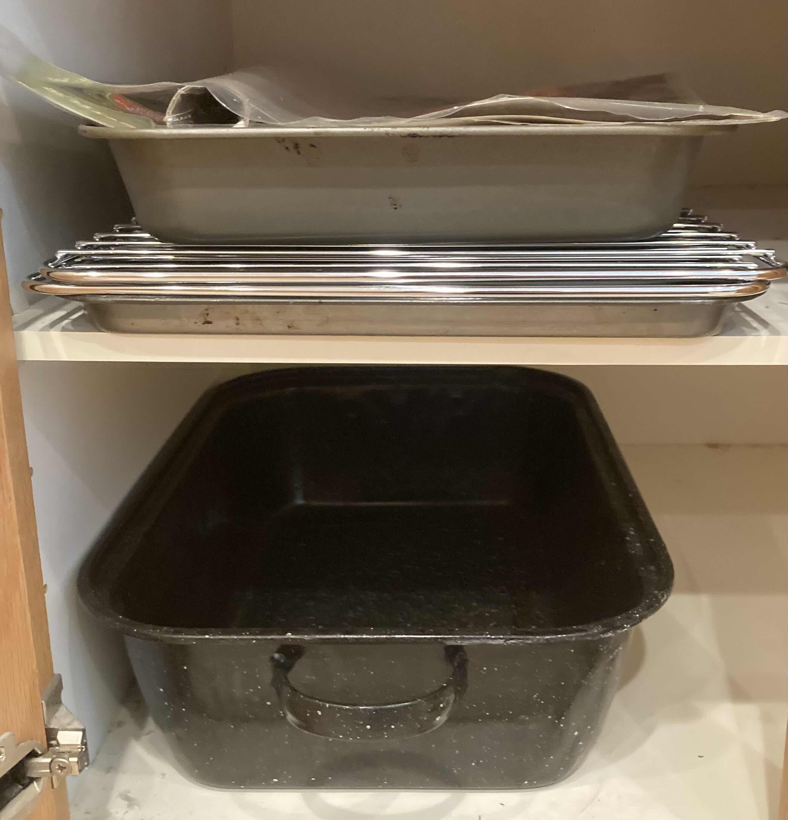 Photo 1 of CONTENTS OF CABINET- BAKING PANS