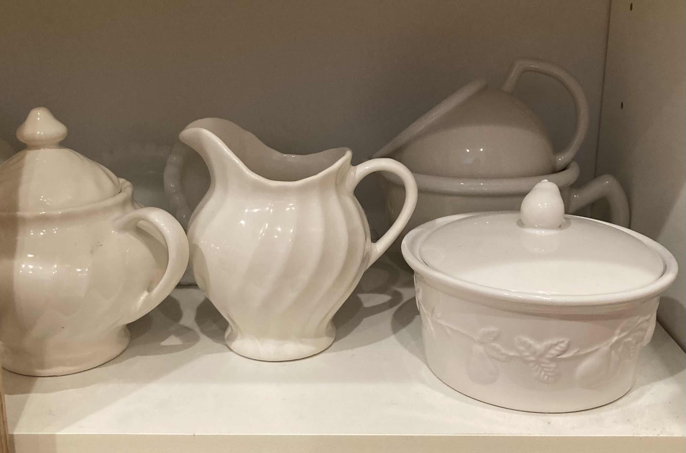 Photo 1 of CONTENTS OF CABINET- CREAMERS, CANISTERS & VASES