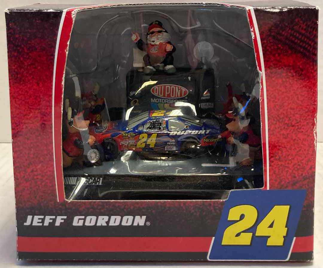 Photo 1 of NASCAR JEFF GORDON #24 COLLECTABLE PIT CREW CHRISTMAS THEMED TABLE TOP & 2 COLLECTABLE ORNAMENTS