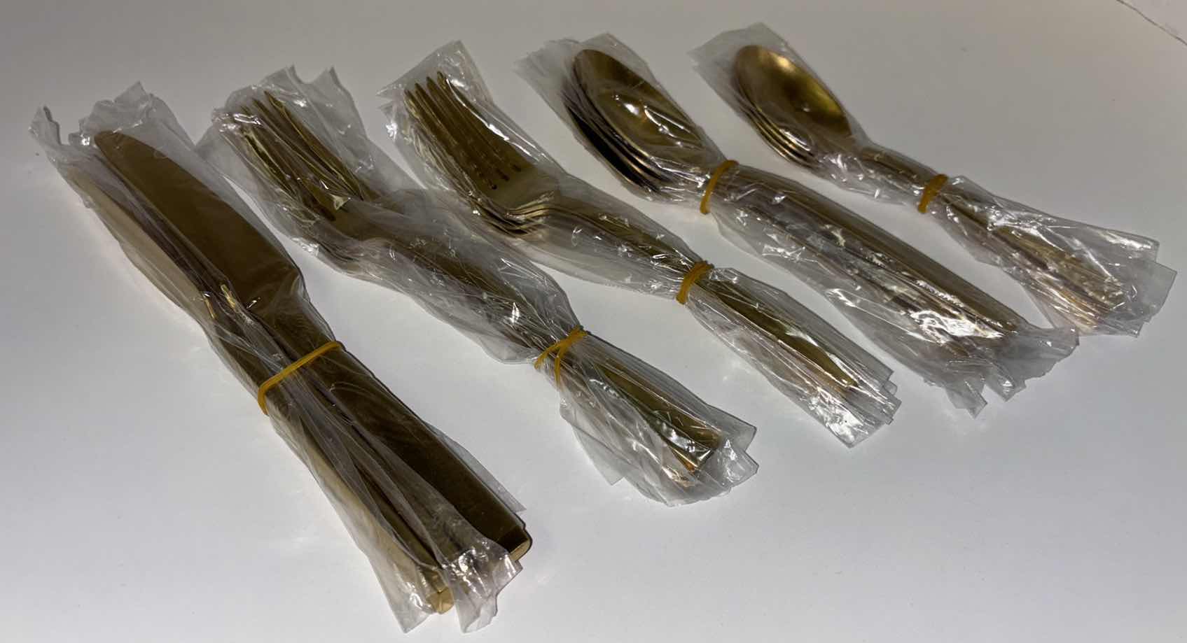 Photo 1 of NEW SKANDIA CLEARVIEW GOLD 20 PC TITANIUM COATED FLATWARE SET SERVICE FOR FOUR