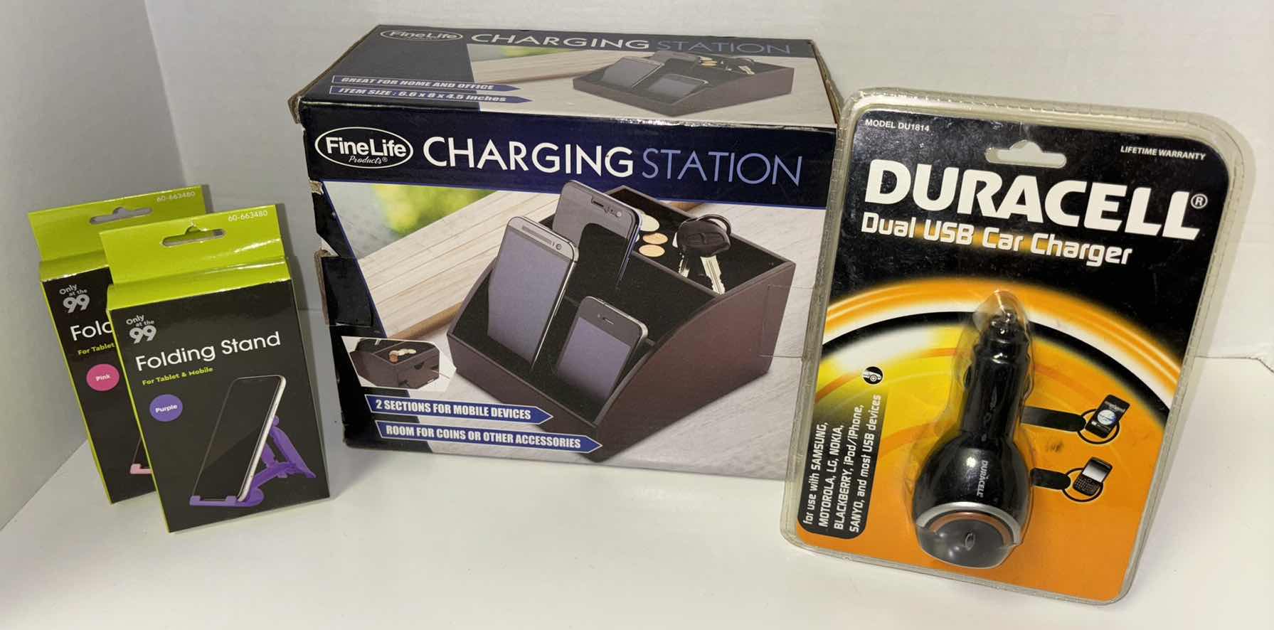 Photo 1 of NEW FINE LIFE CHARGING STATION, DURACELL DUAL USB CAR CHARGER & 2 FOLDING STANDS (4 PCS)