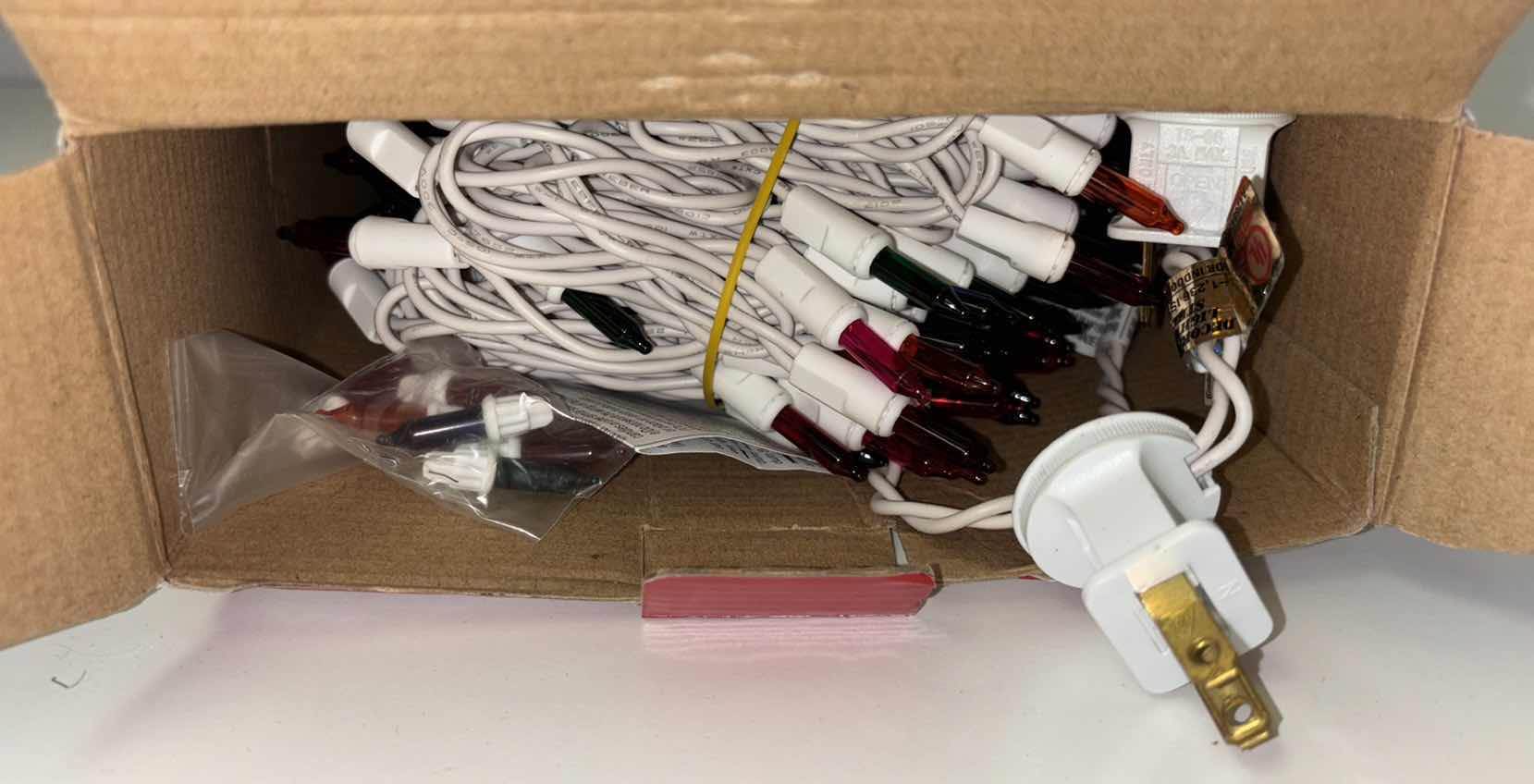 Photo 1 of NEW 2 BOXES CHRISTMAS LIGHT STRANDS- 300 INCANDESCENT CLEAR MINI LIGHTS (68.5’ LIGHTED LENGTH) & 300 MULTI-COLOR MINI LIGHTS (LIGHTED LENGTH 59 FT)