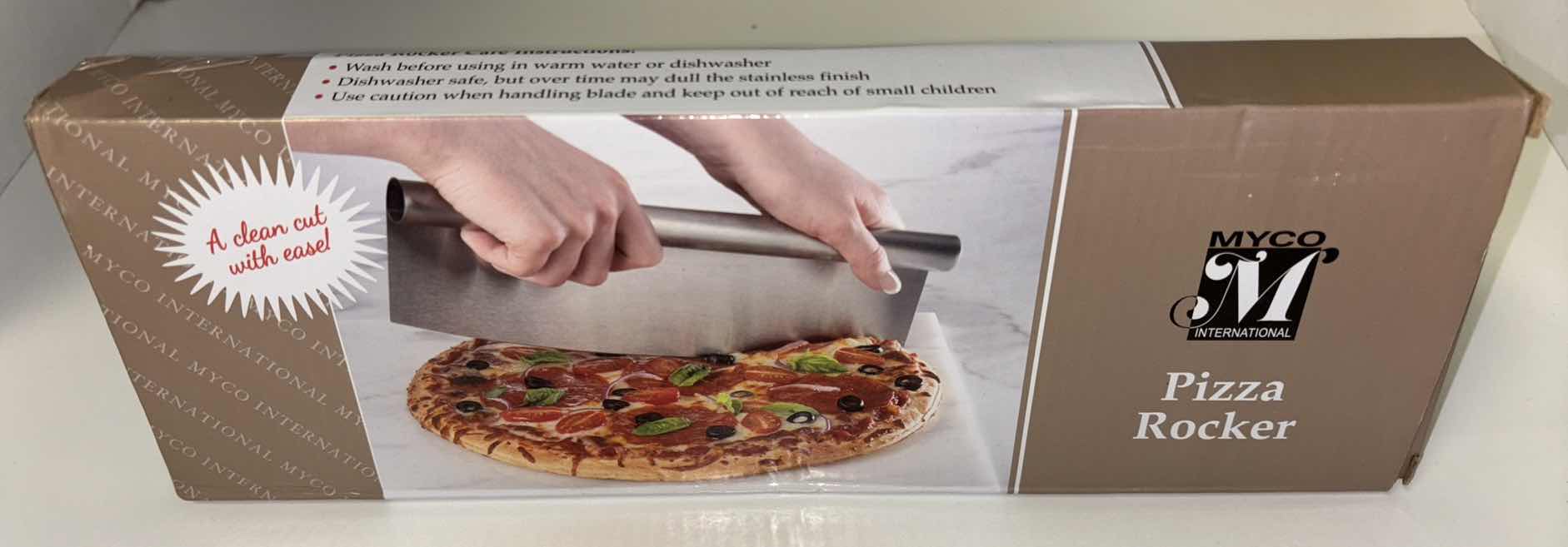 Photo 1 of NEW ROUND CHARCUTERIE/CUTTING BOARD (15” X 20”) & PIZZA ROCKER CUTTER