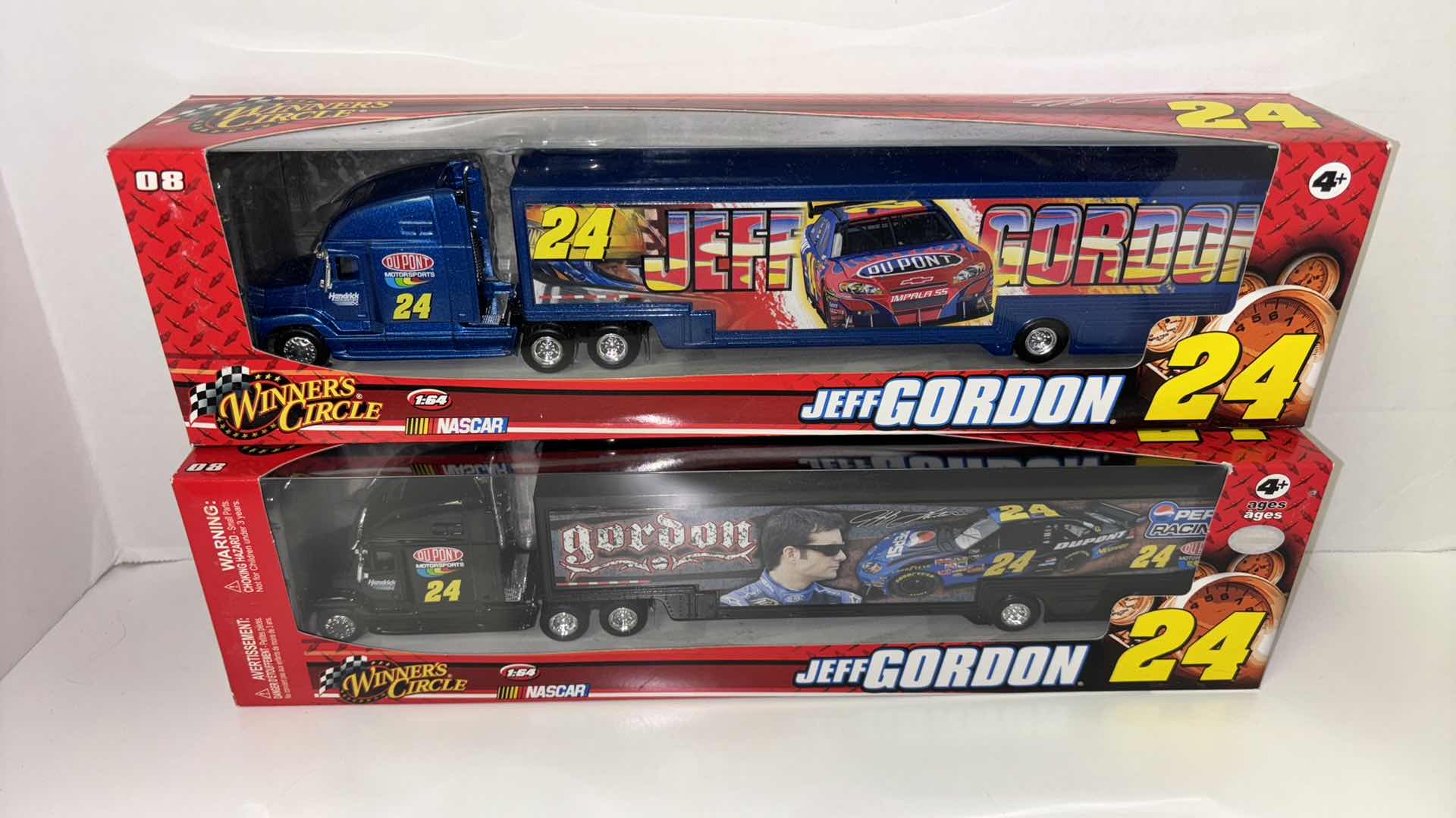 View 1 of NEW 2-PACK WINNERS CIRCLE NASCAR 2009 JEFF GORDON #24 1:64 SCALE RIG/TRAILER SETS (#90062 & #70546)