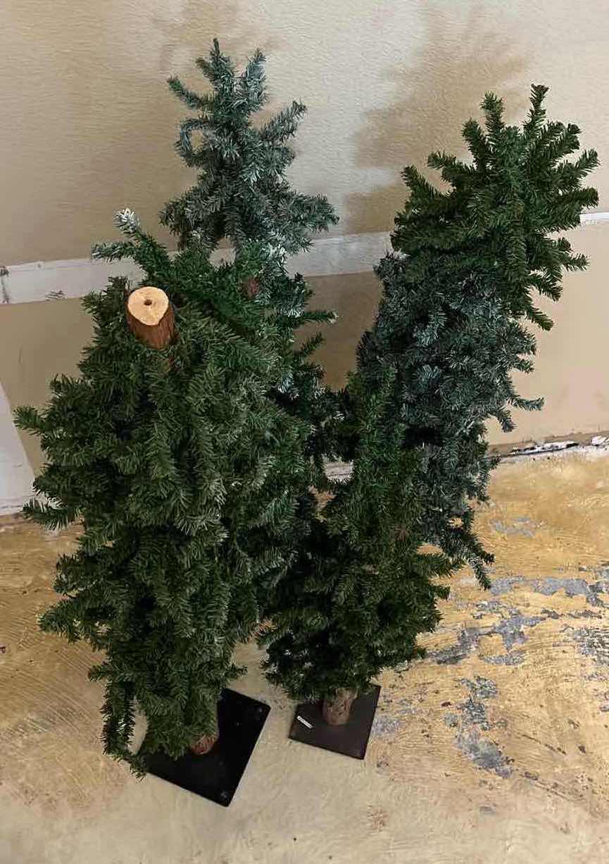 Photo 1 of CHRISTMAS REALISTIC PINE TREES W METAL STANDS (4) H38”-H48”