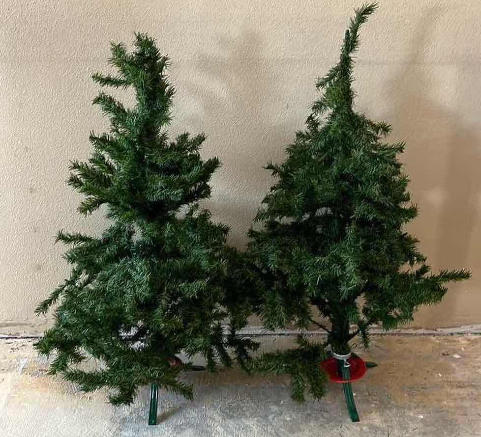Photo 1 of CHRISTMAS TREES W STANDS (3) 18”-24” X H39”-52”