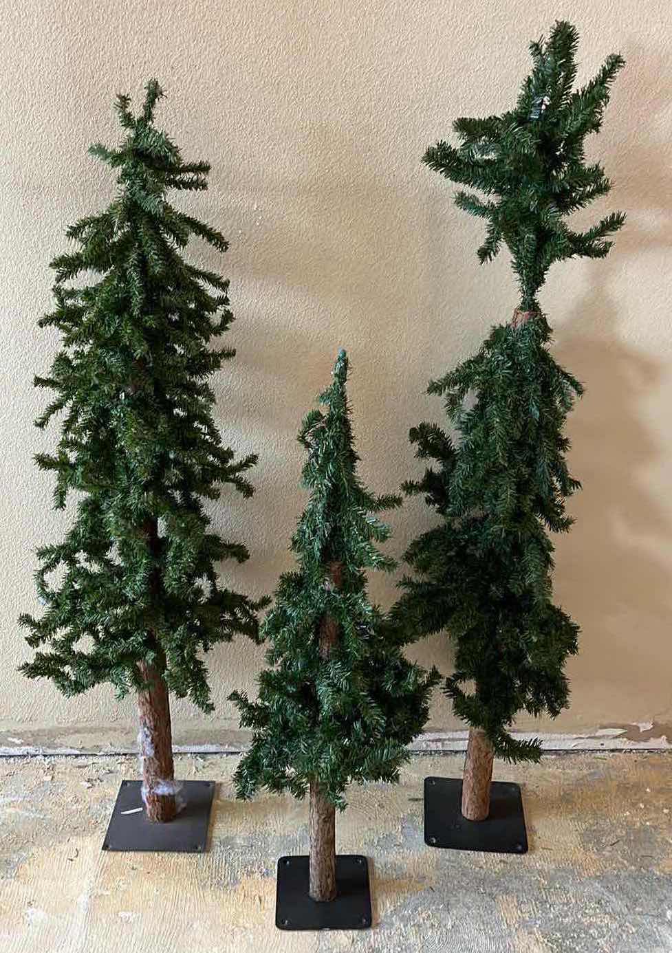 Photo 1 of CHRISTMAS REALISTIC PINE TREES W METAL STANDS (4) H38”-H53”