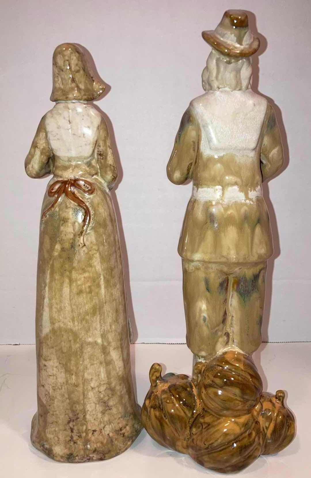 Photo 1 of AMISH WIFE & HUSBAND PUMPKIN FARMER PORCELAIN FIGURINES H12”